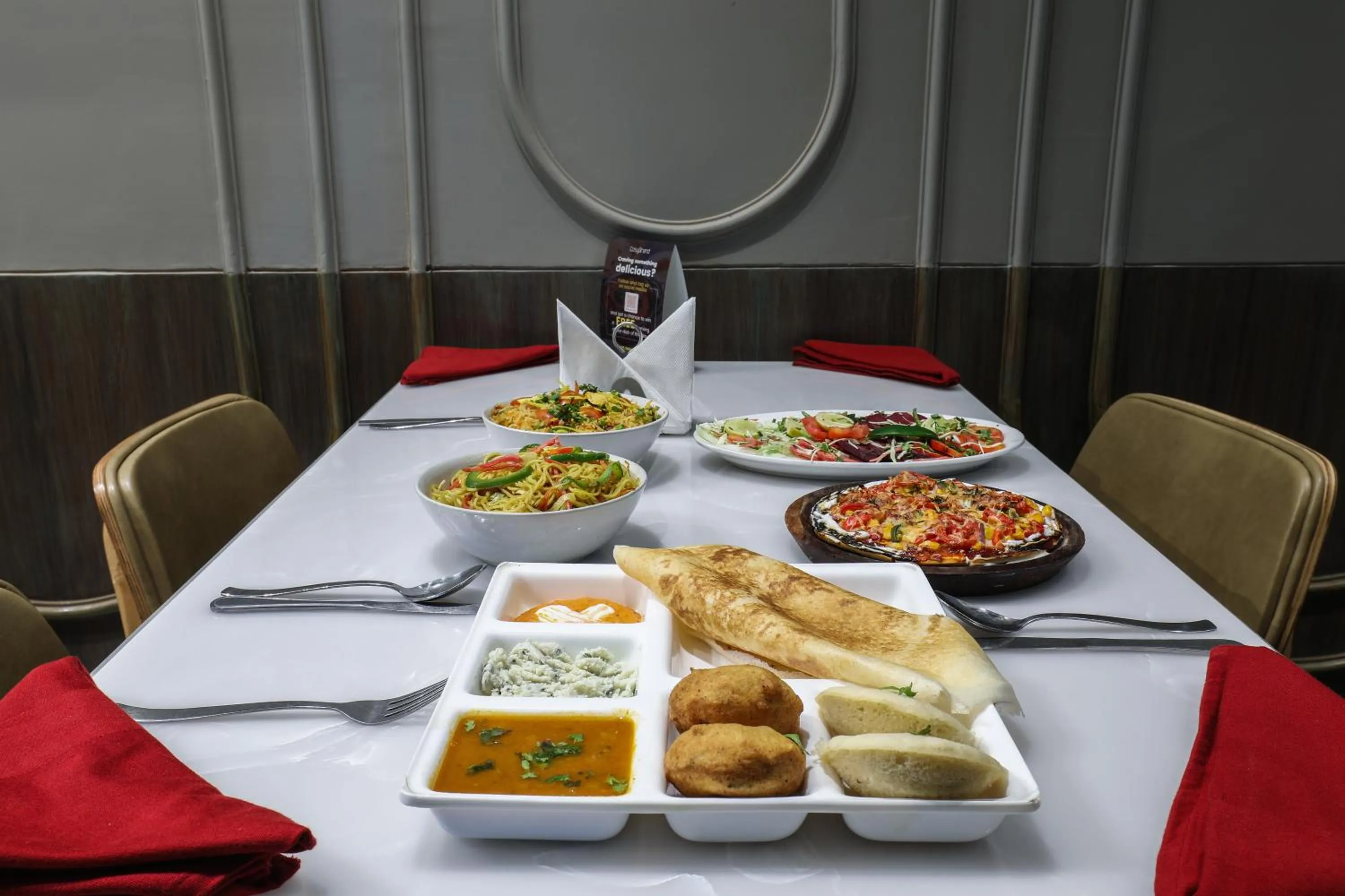 Food and drinks in Cosy Grand, Chanakyapuri by The Cosy Hotels