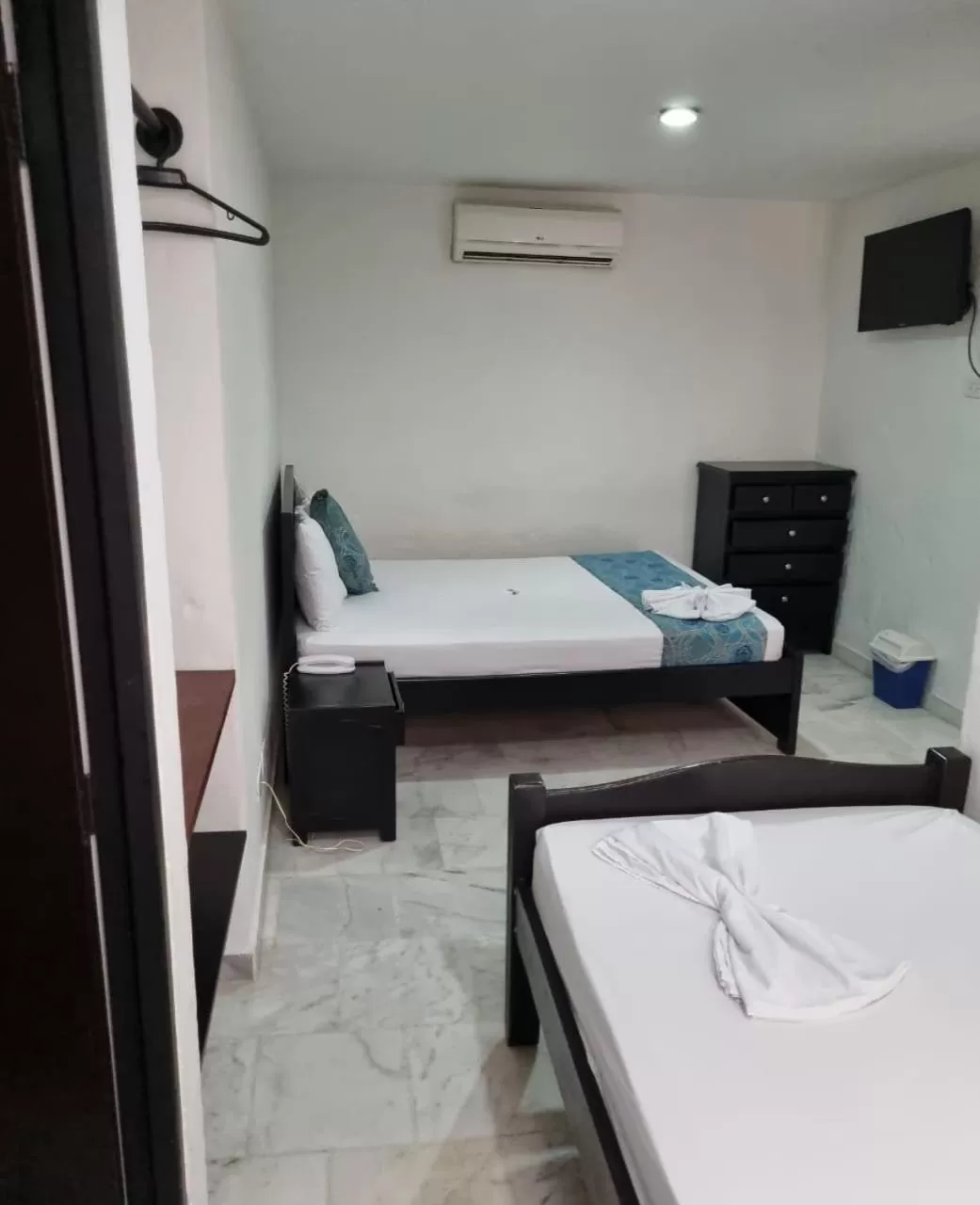 Bed in Blue Star Hotel