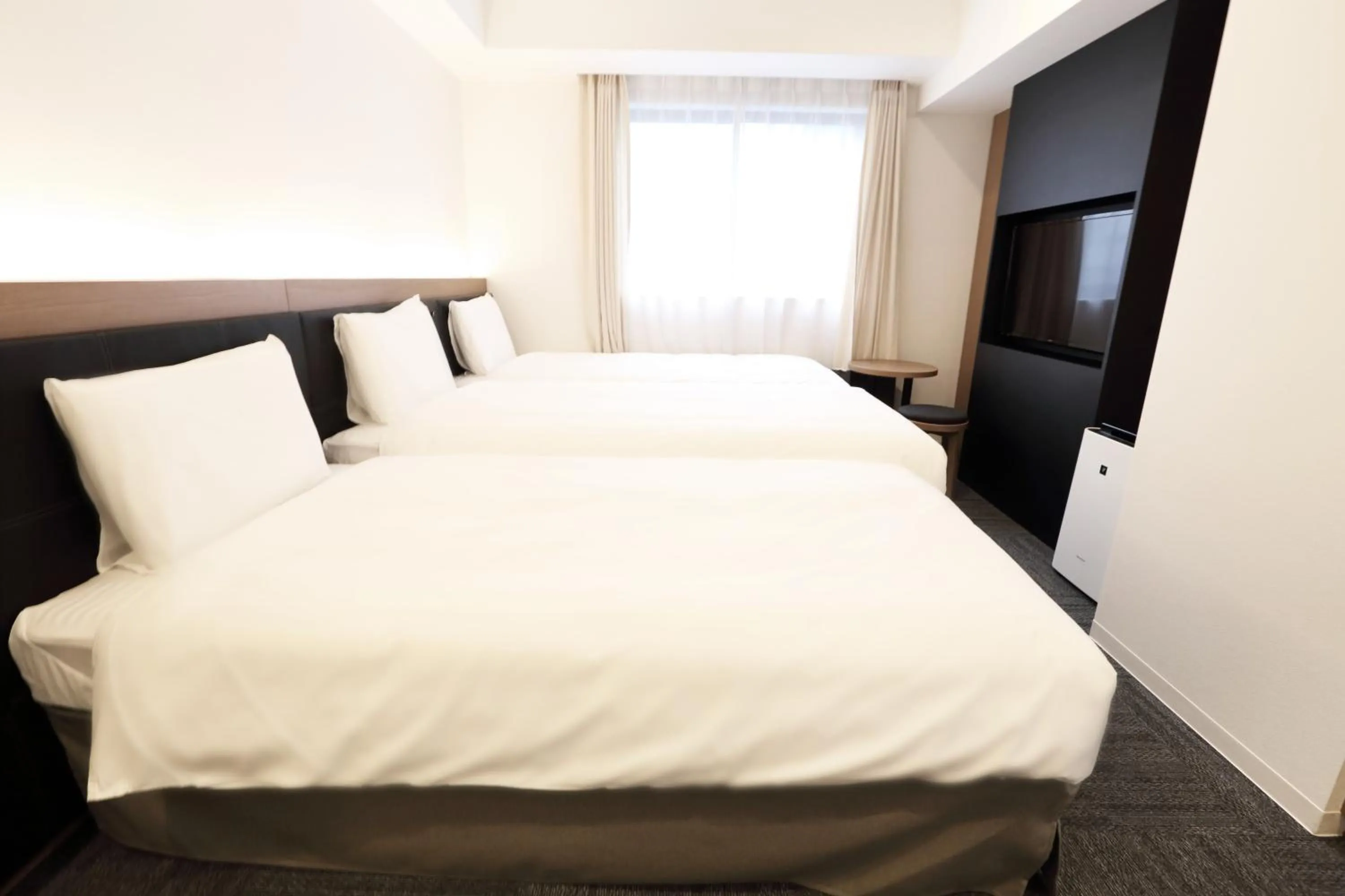 Bed in Henn na Hotel Osaka Namba