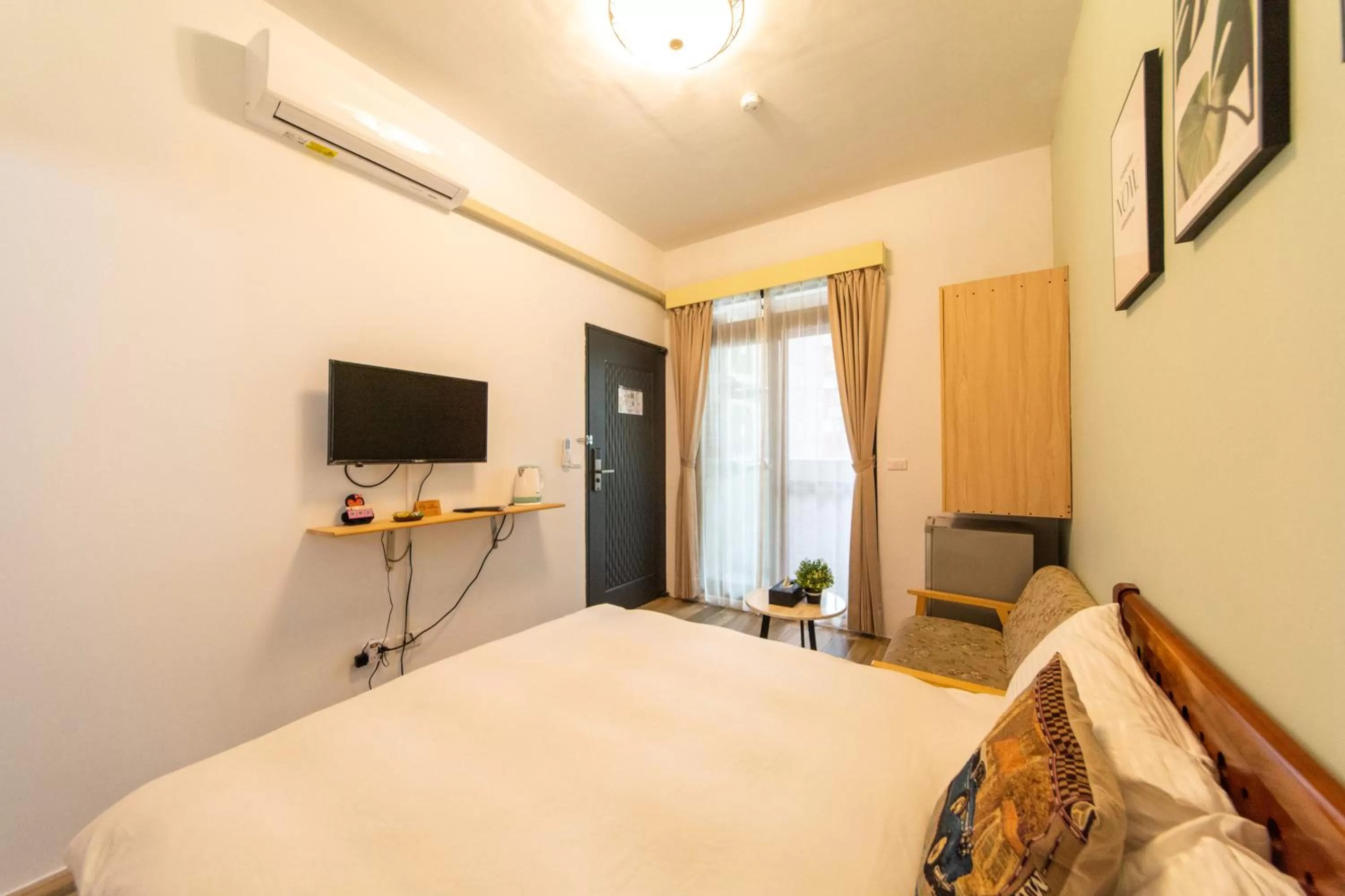 Decorative detail, Bed in Jinguann B&B