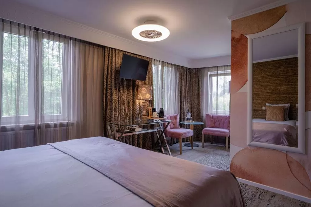 Bed in Boutique Hotel Slenaker Vallei - Buitengewoongenieten