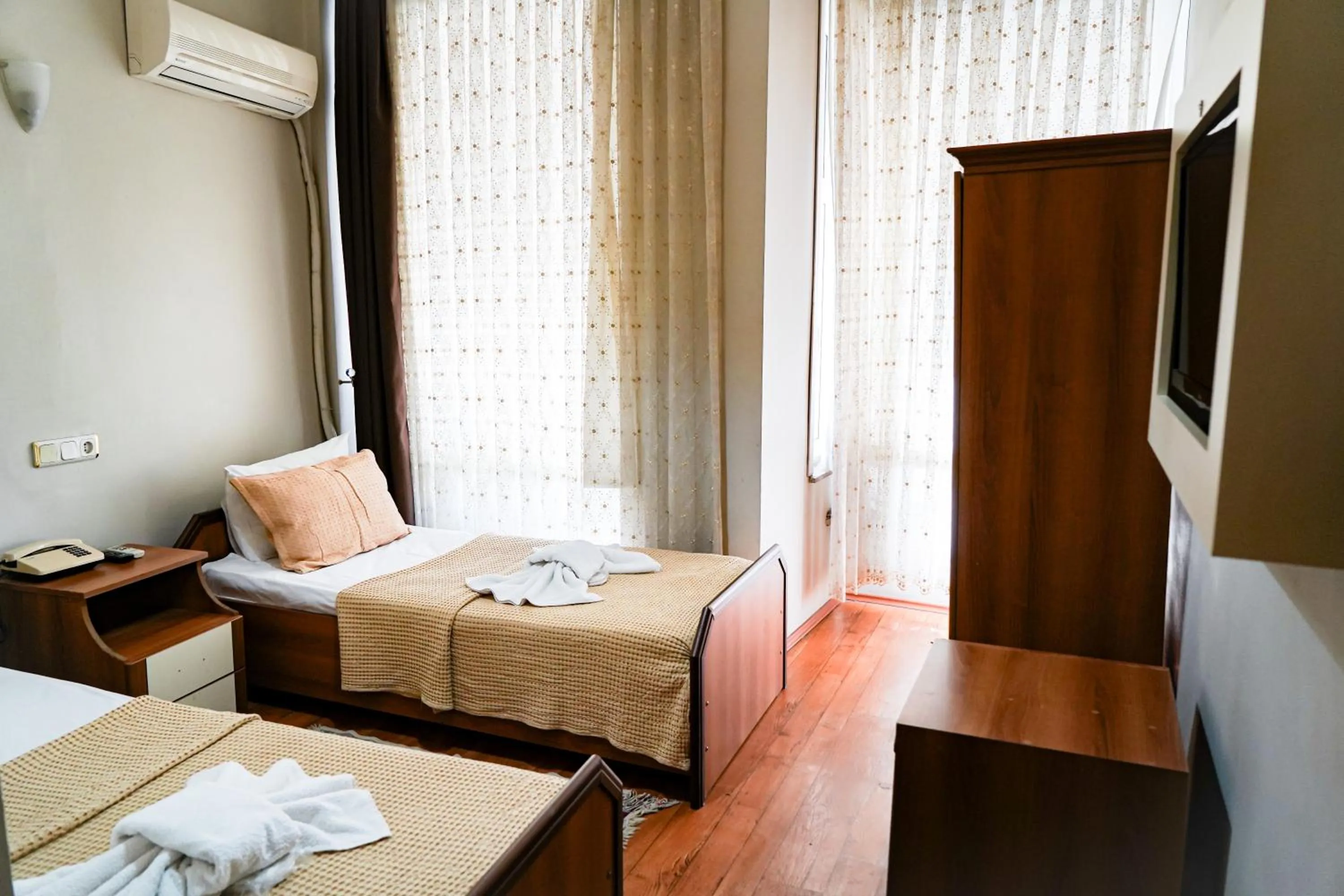 Photo of the whole room, Bed in Paradise Hotel