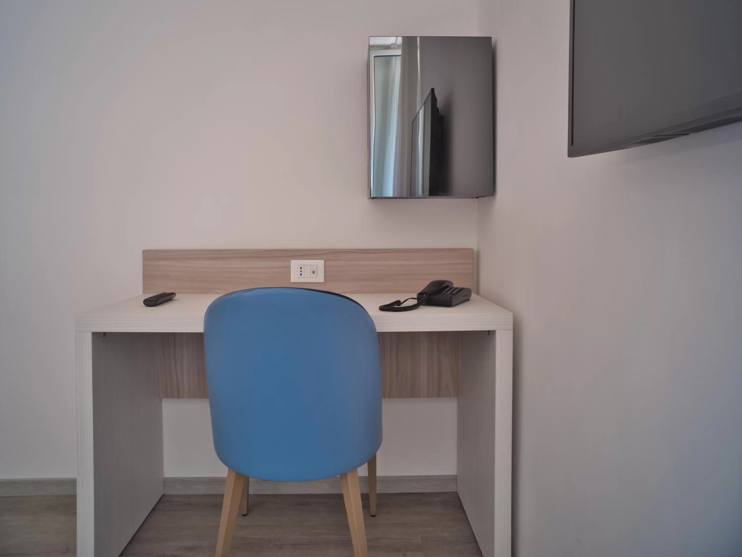 TV and multimedia, TV/Entertainment Center in Hotel Medusa