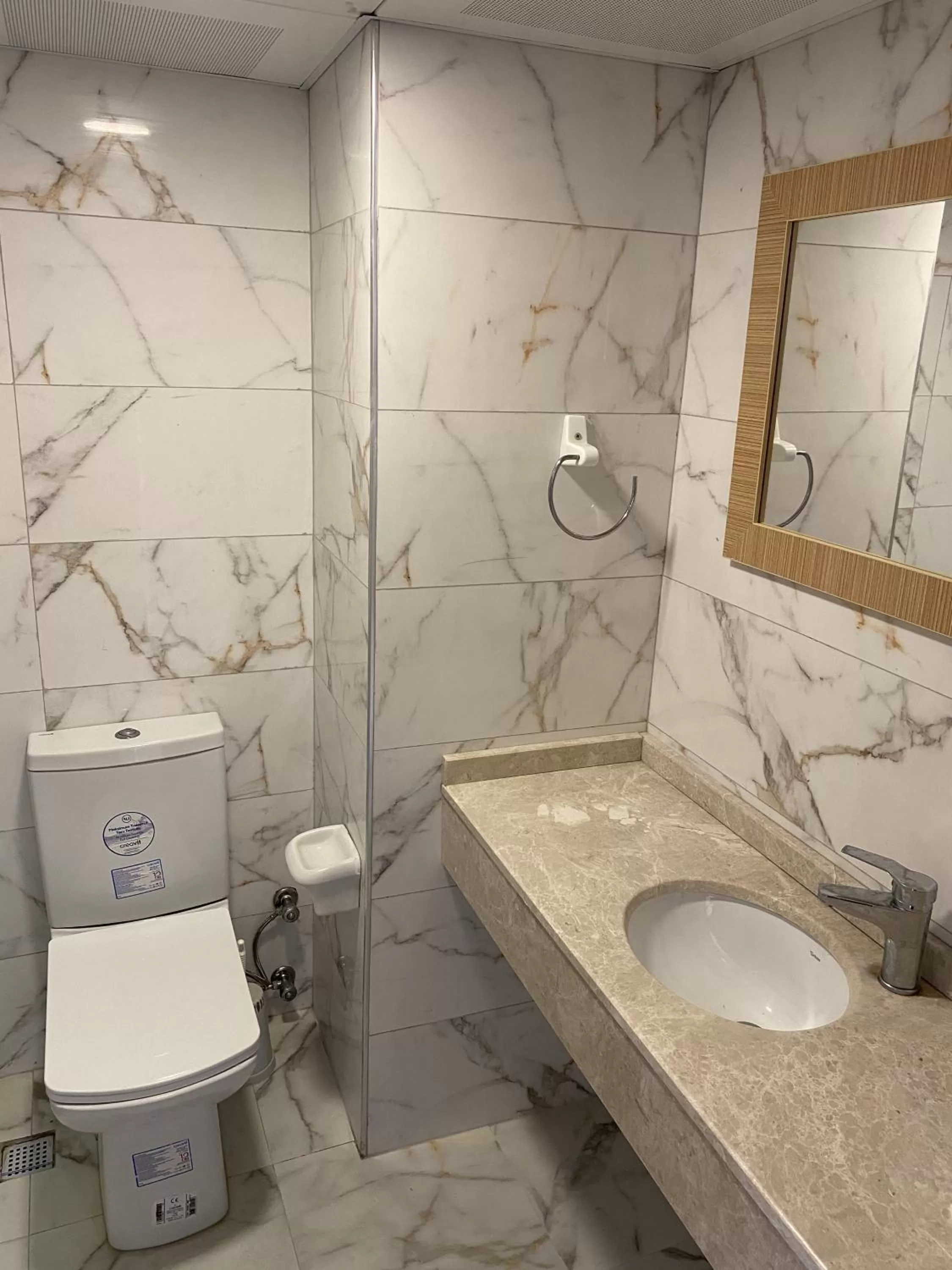 Bathroom in Tuntas Family Suites Kusadasi