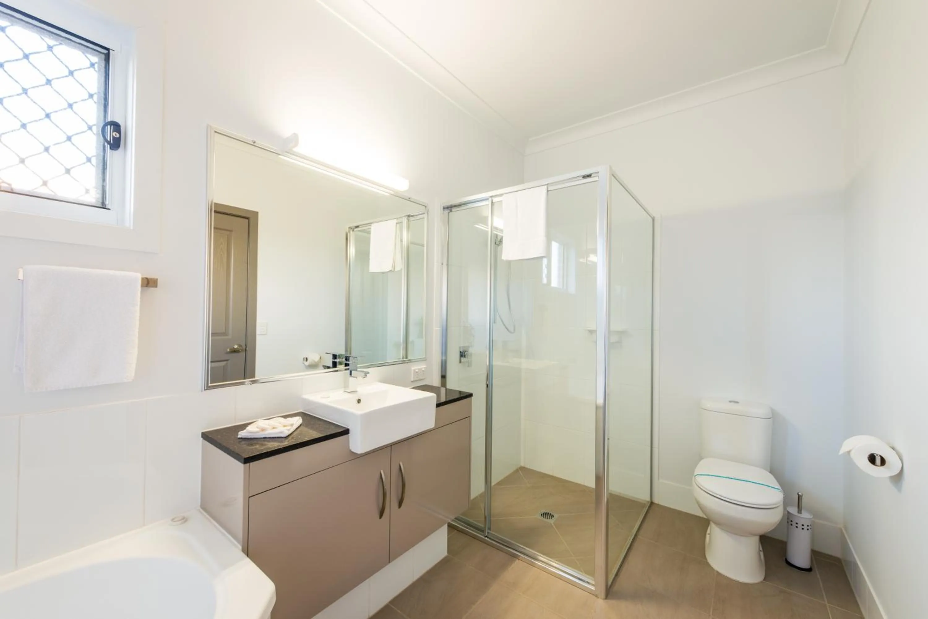 Shower in Athena Motel Apartments