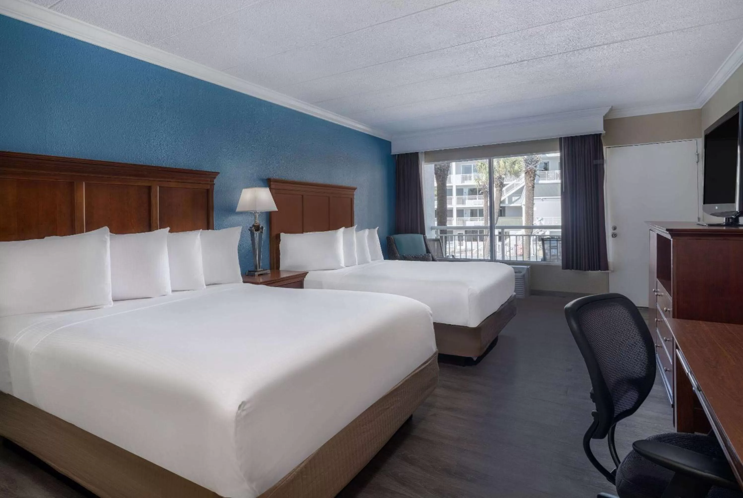 Photo of the whole room, Bed in The Sandbar Hotel, Trademark Collection by Wyndham