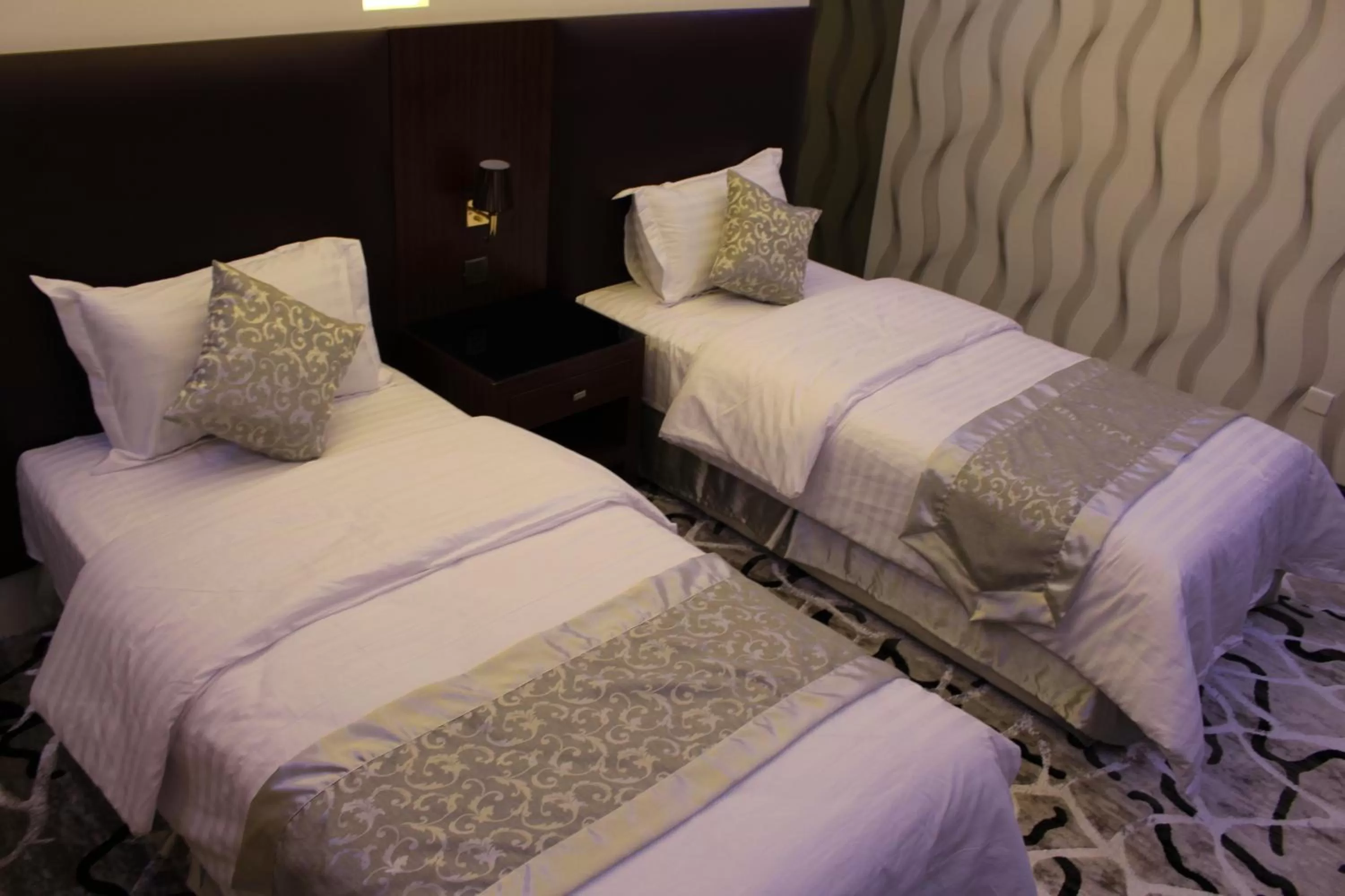 Bed in Sama Hotel