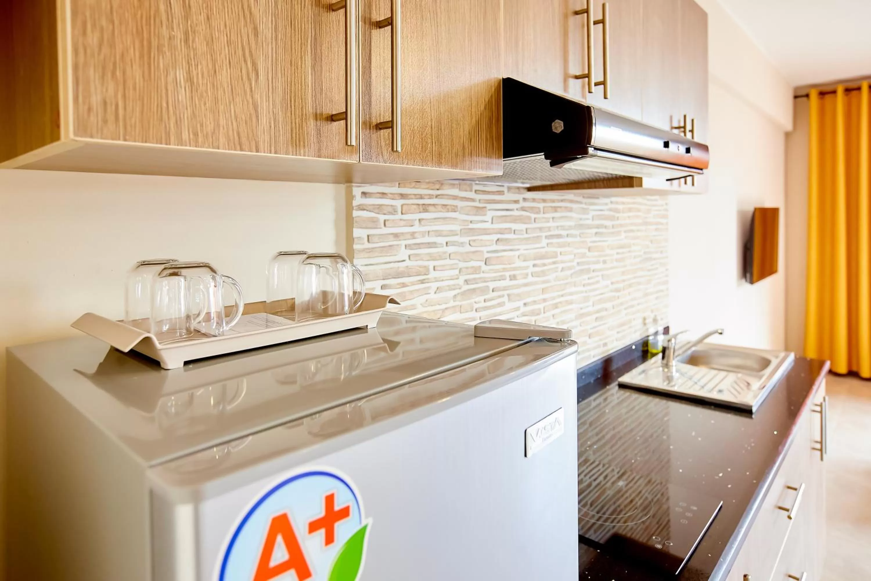 Kitchen or kitchenette, Kitchen/Kitchenette in La Pergola - Appartement Hôtel