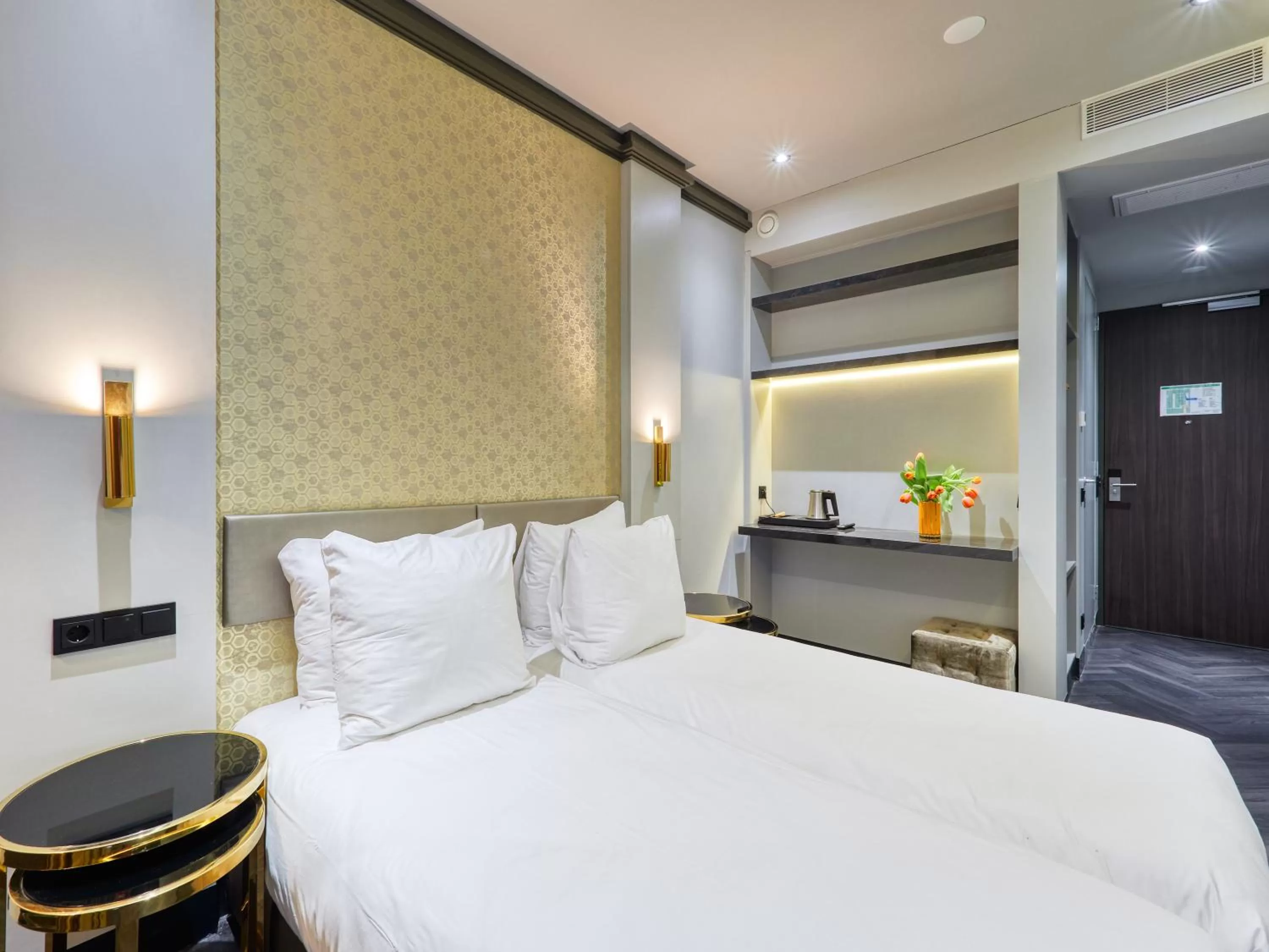 Bed in Triple G Hotels