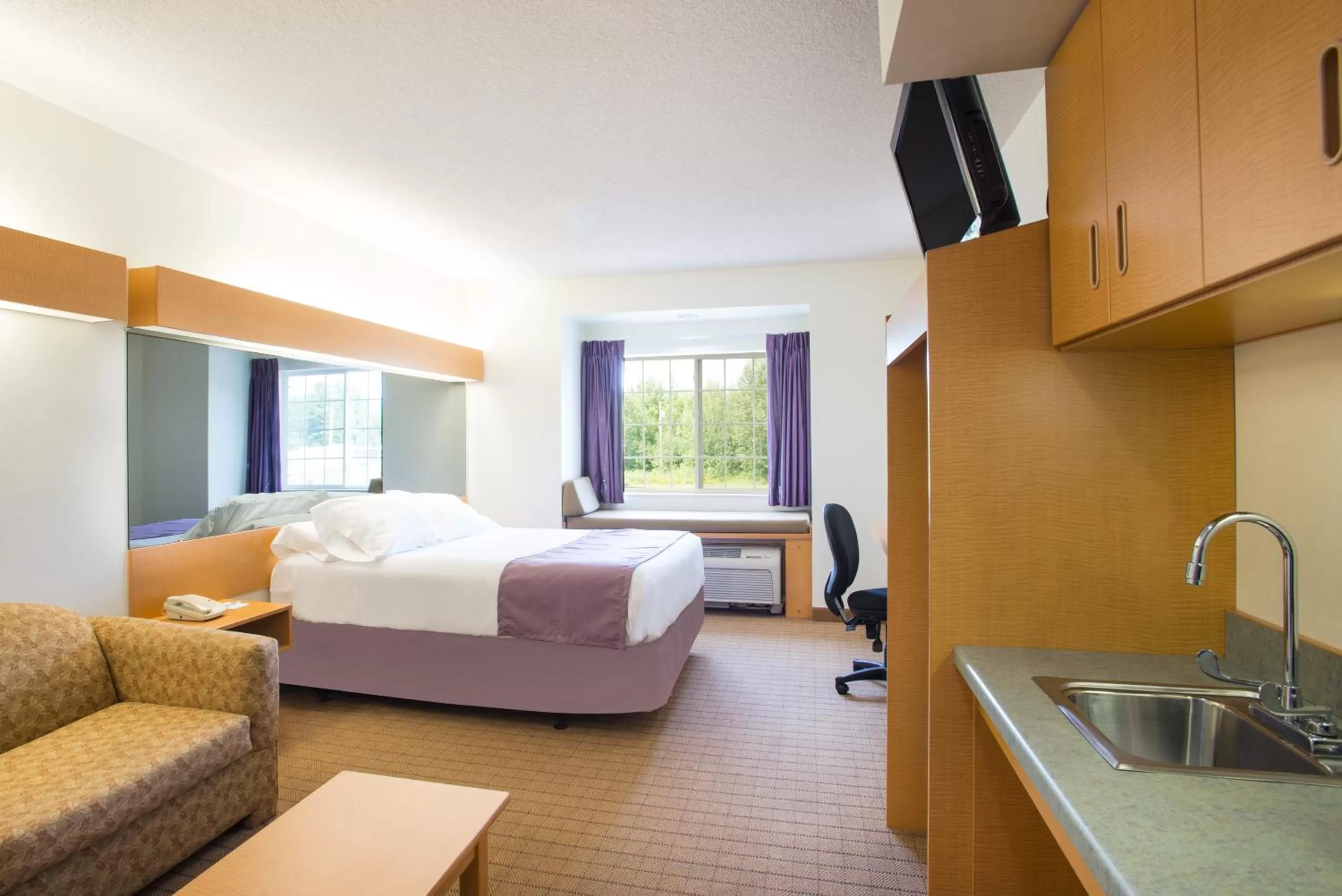 Photo of the whole room, Bed in Microtel Inn & Suites by Wyndham Plattsburgh