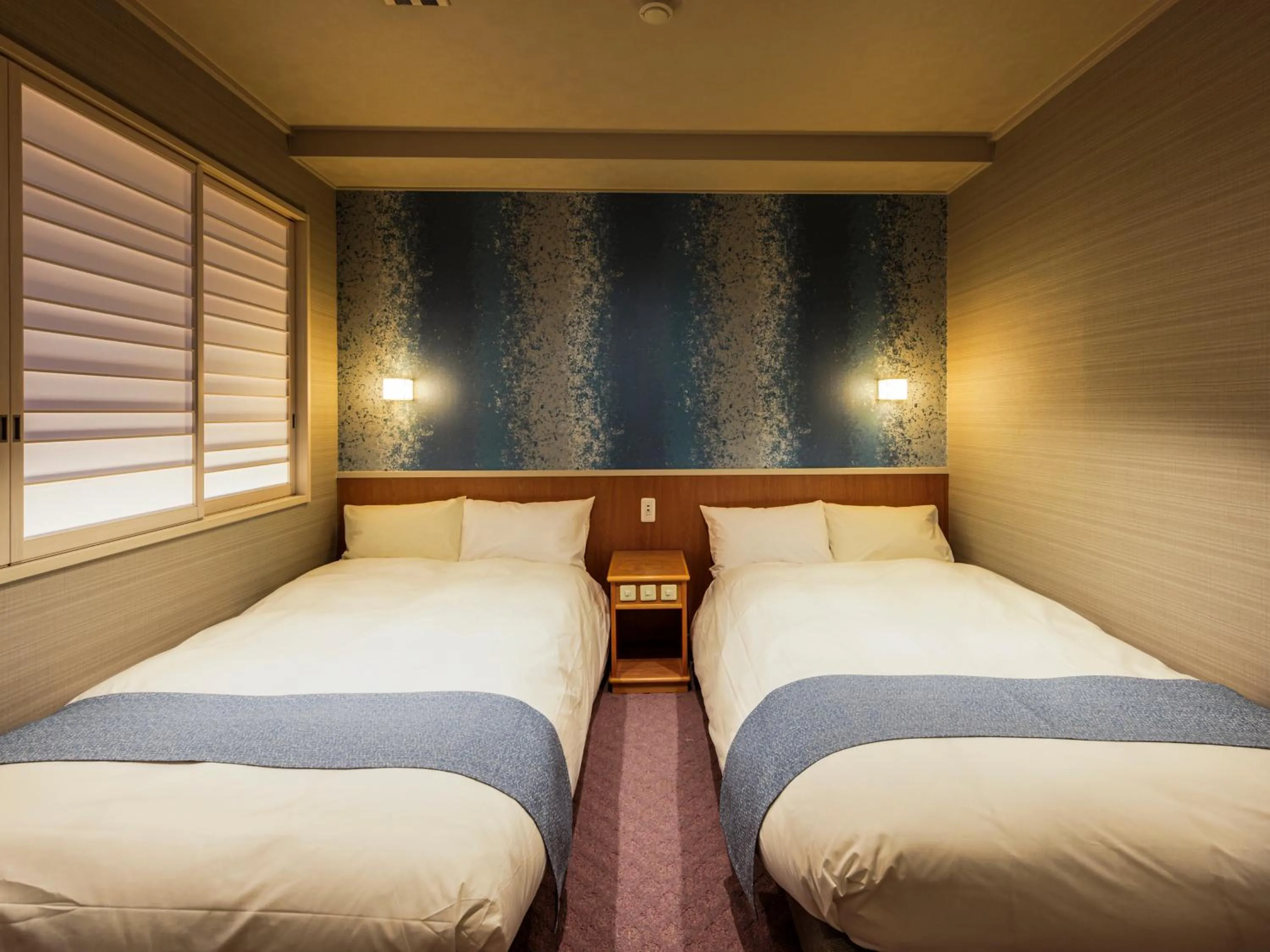 Bed in Ito Hotel Juraku