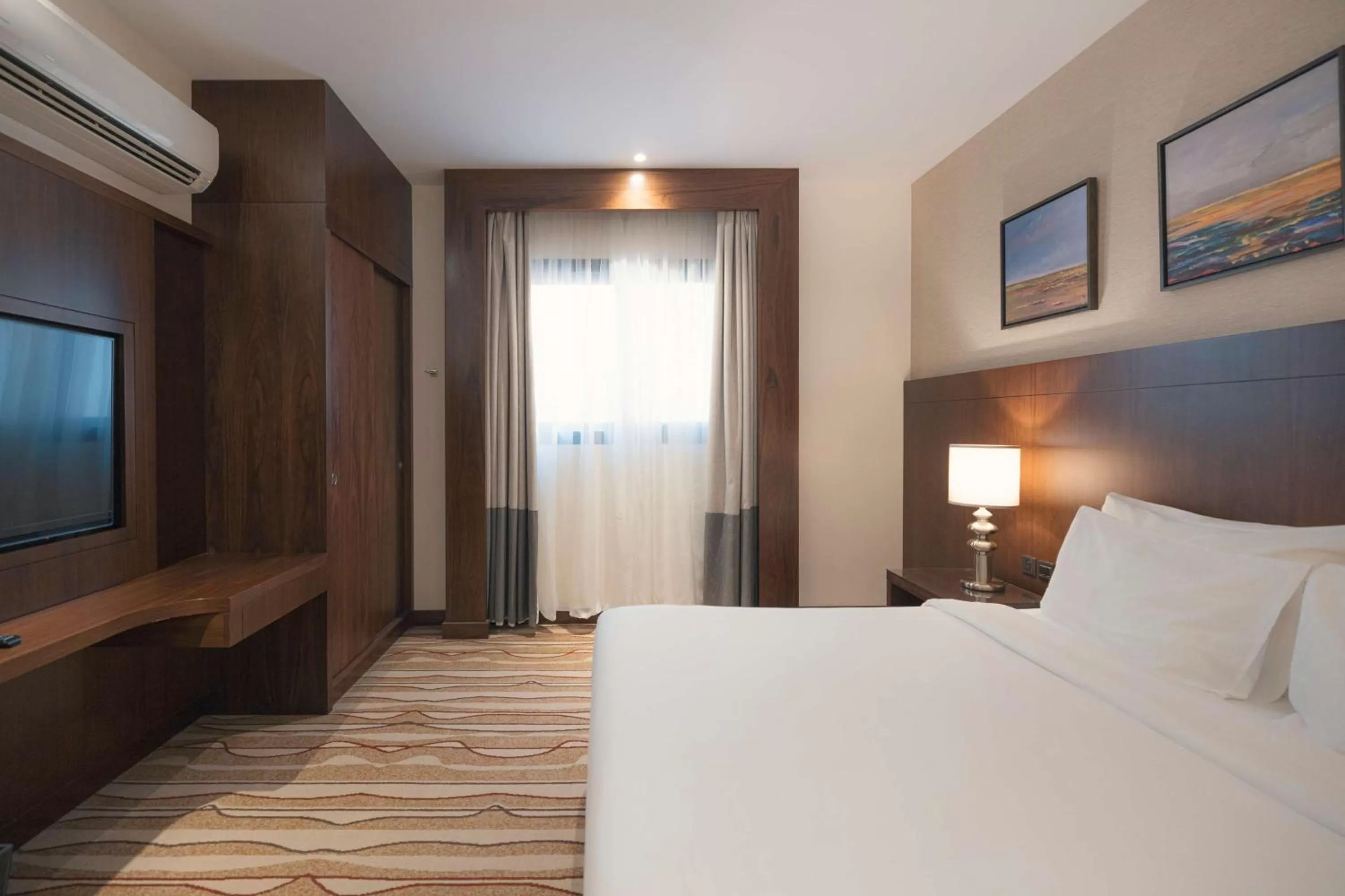 Photo of the whole room, Bed in Radisson Blu Hotel, Buraidah