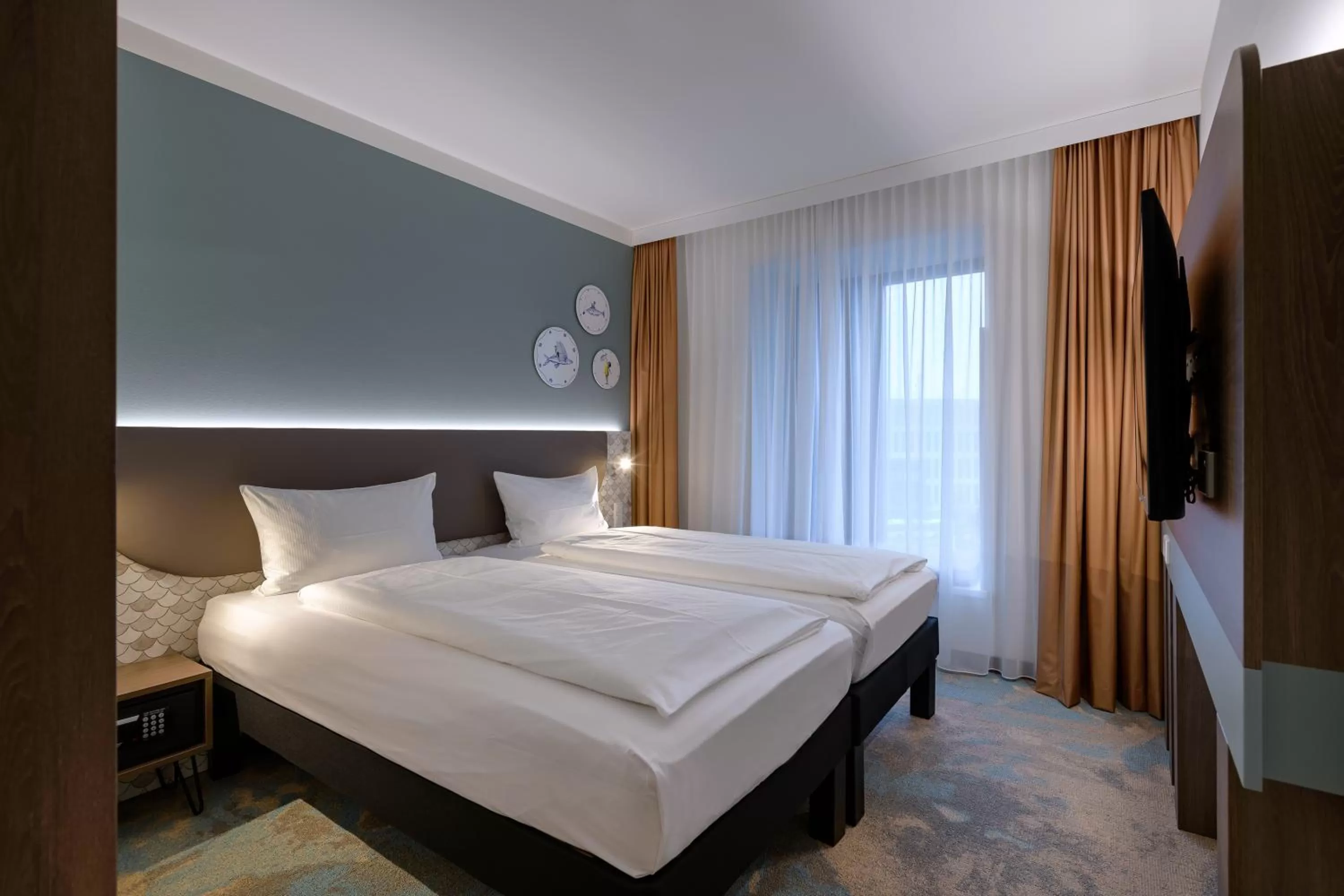 Photo of the whole room, Bed in ibis Styles Kiel City