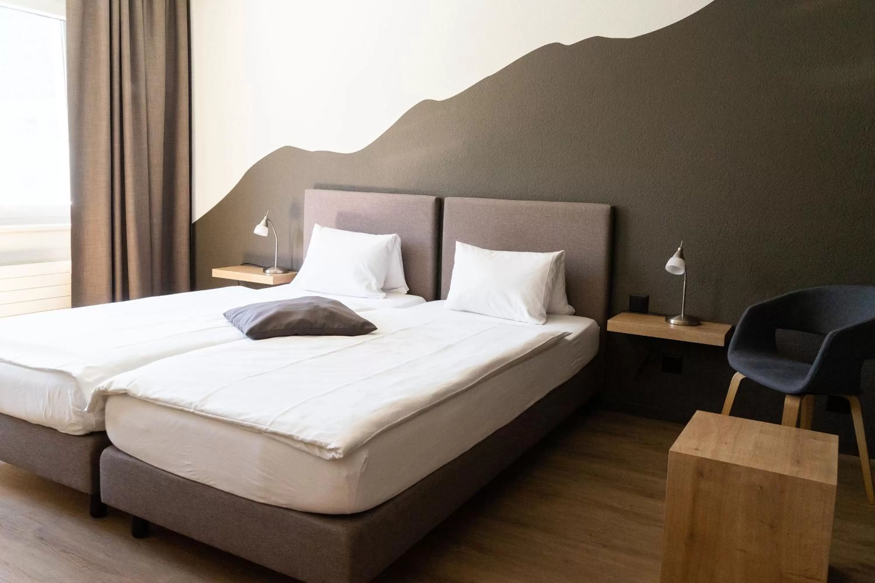 Bed in Tailormade Hotel STANS SÜD