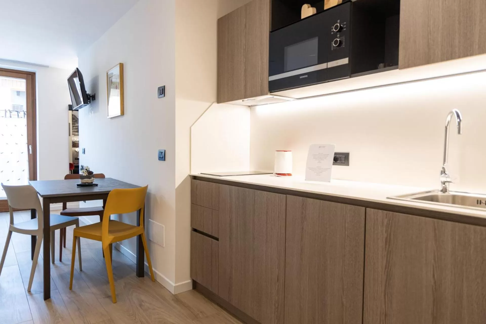 Kitchen or kitchenette in Olimpia Hotel