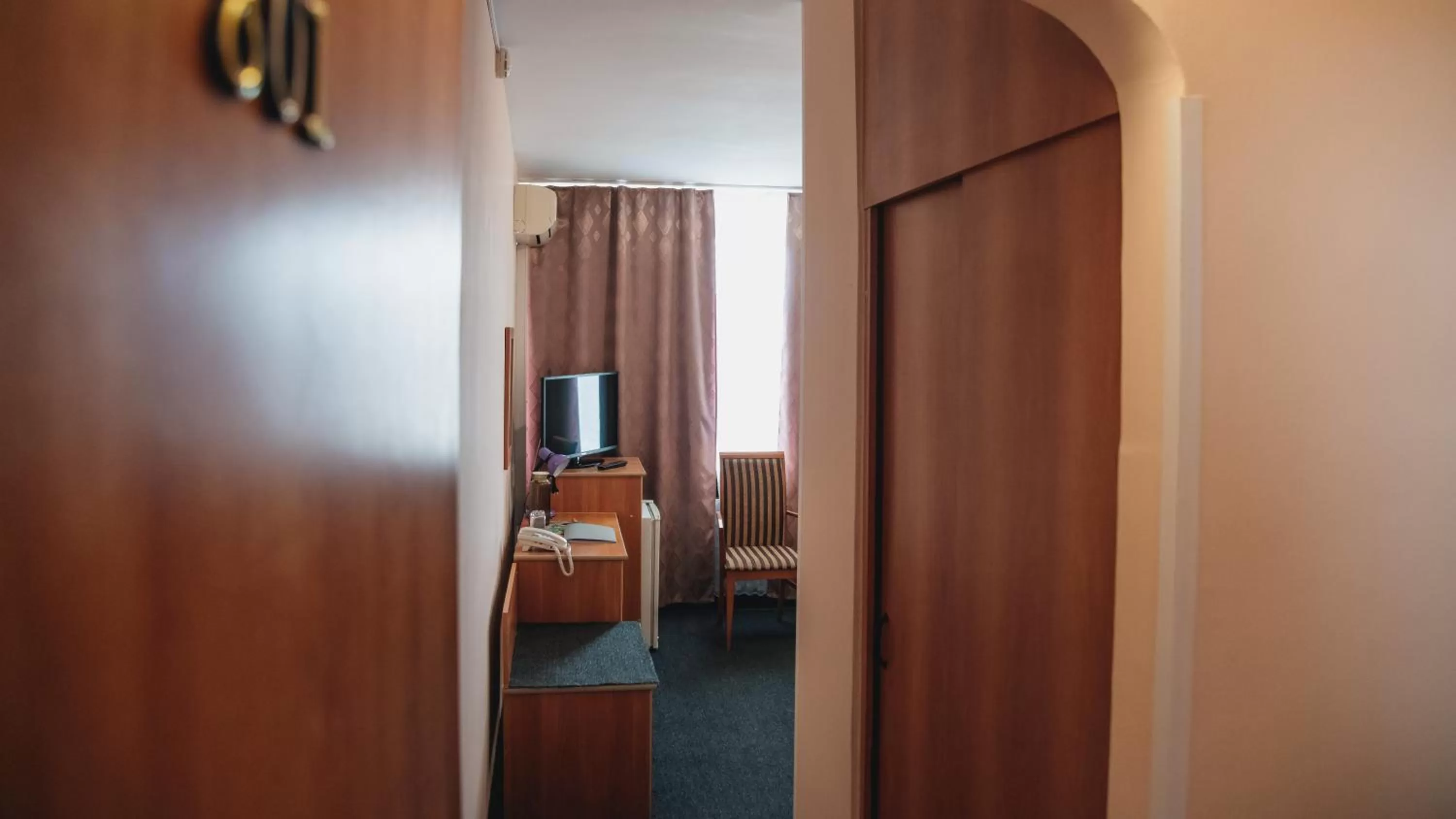 Photo of the whole room, TV/Entertainment Center in Aktobe Hotel