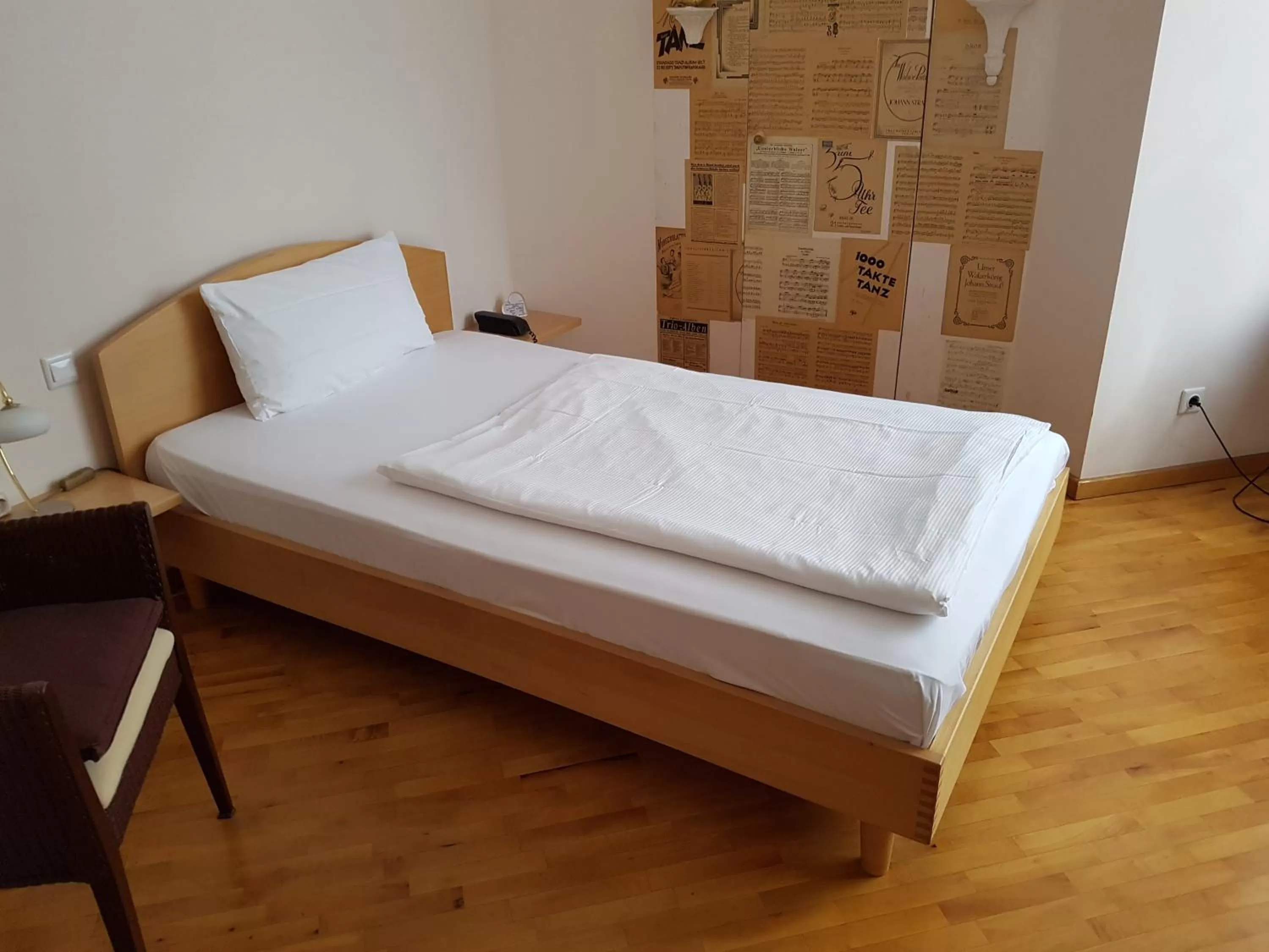 Bed in Art-Hotel Robert Mayer