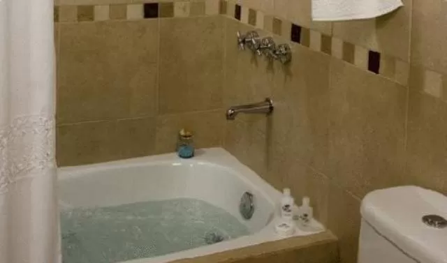 Bathroom in Hosteria Roblesur