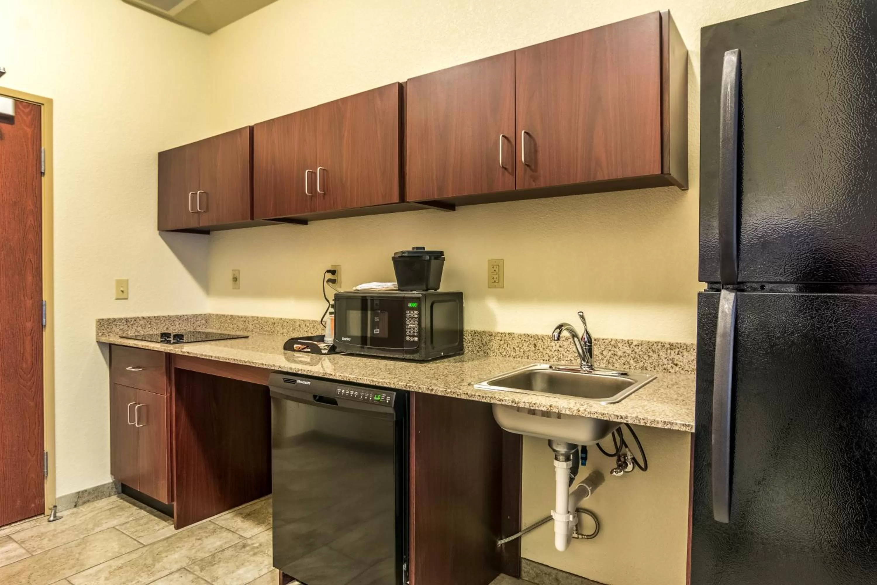 Kitchen or kitchenette in Cobblestone Hotel & Suites - Greenville