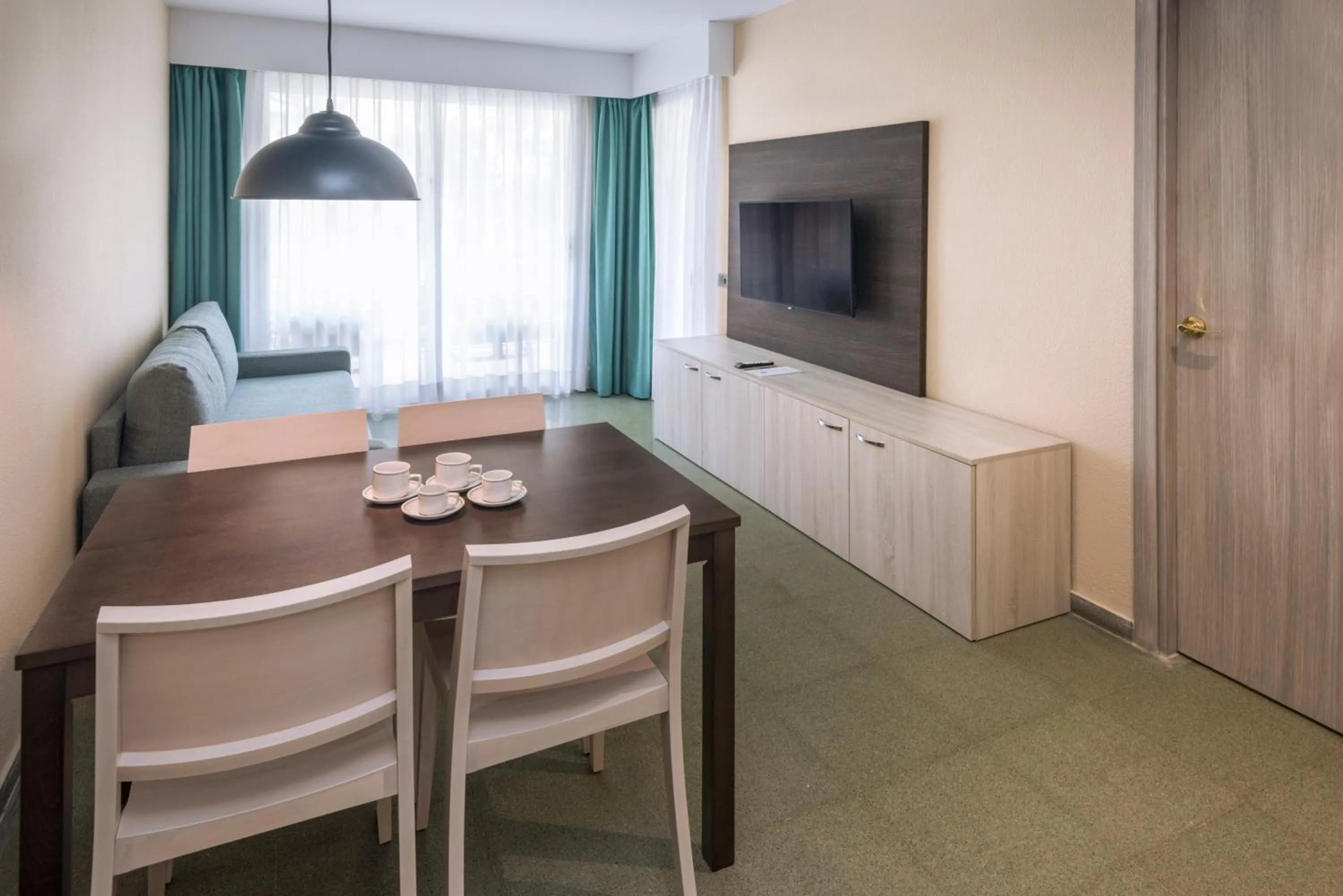 Living room in GHT Oasis Park & Spa