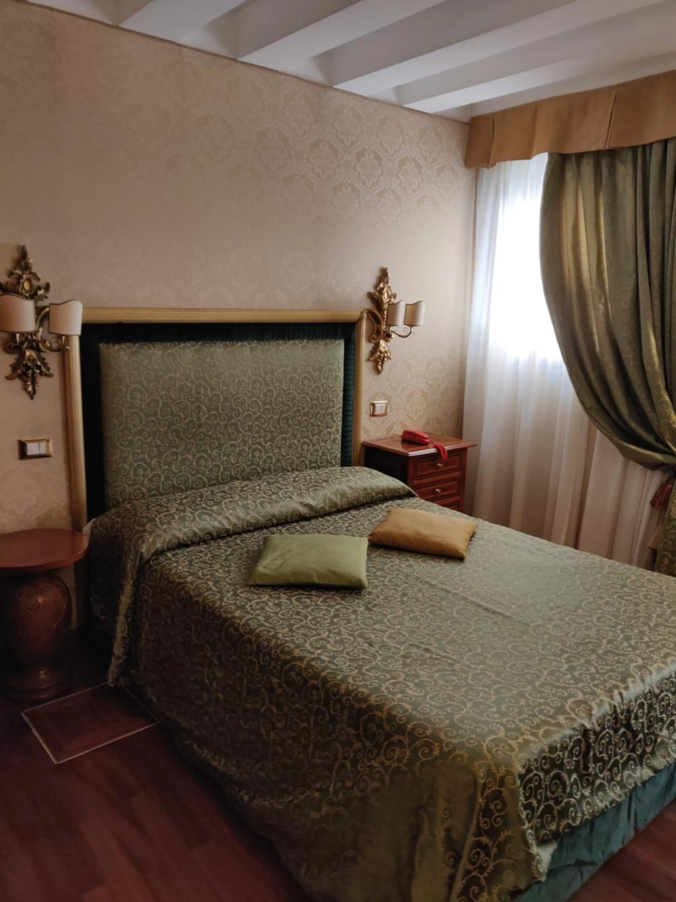 Bed in Hotel Ca' Marinella