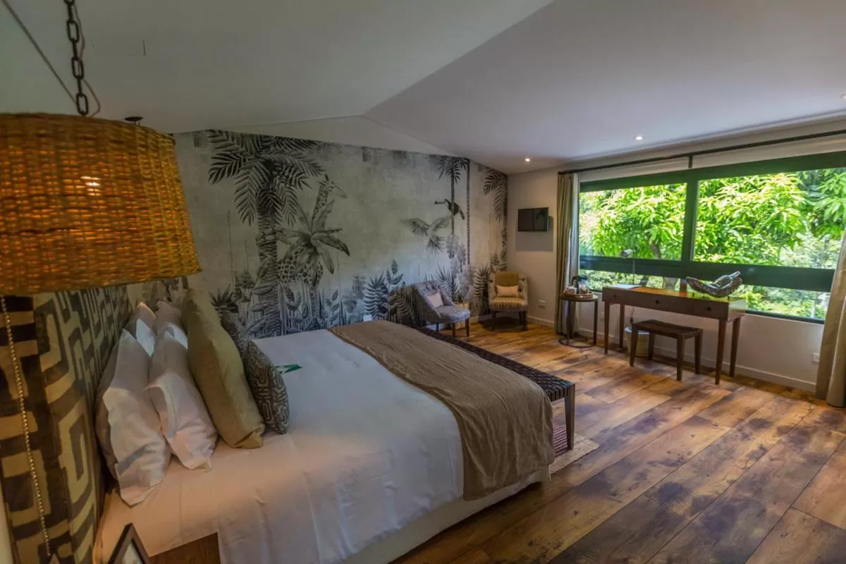 Photo of the whole room, Bed in Patio del Mundo