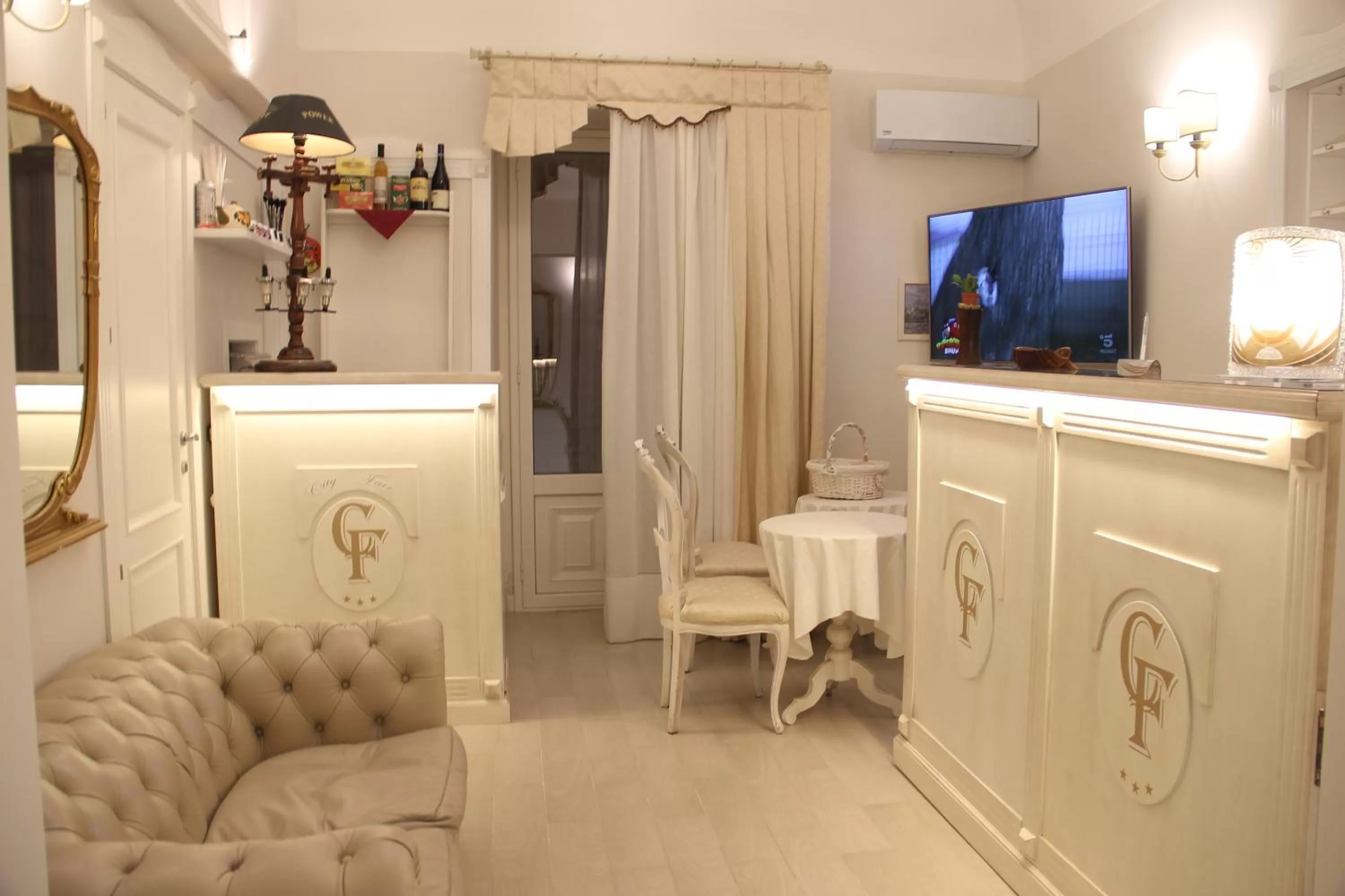 Communal lounge/ TV room in B&b Cityfair