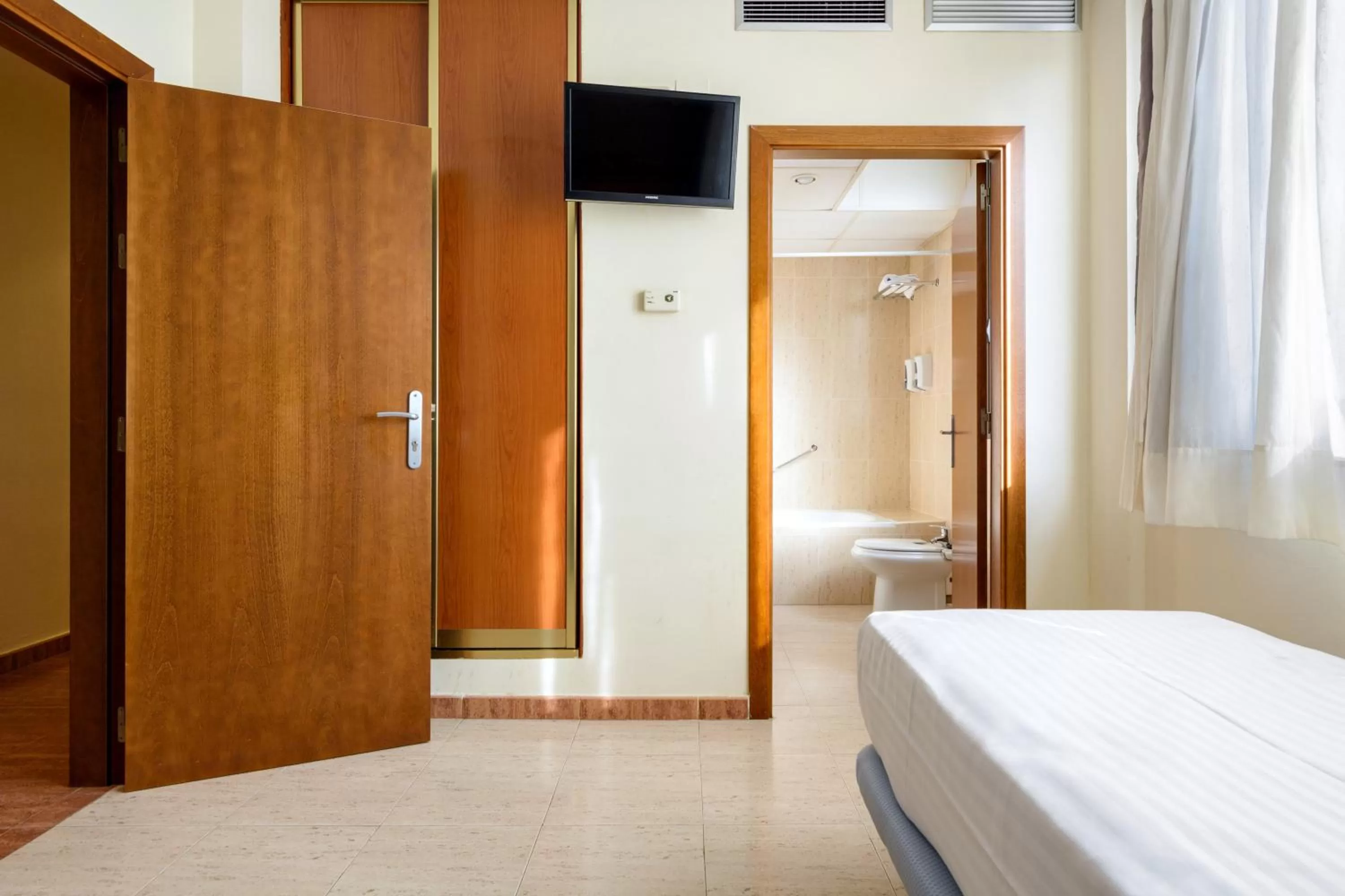 Bed in Hospedium Hotel Don Fidel