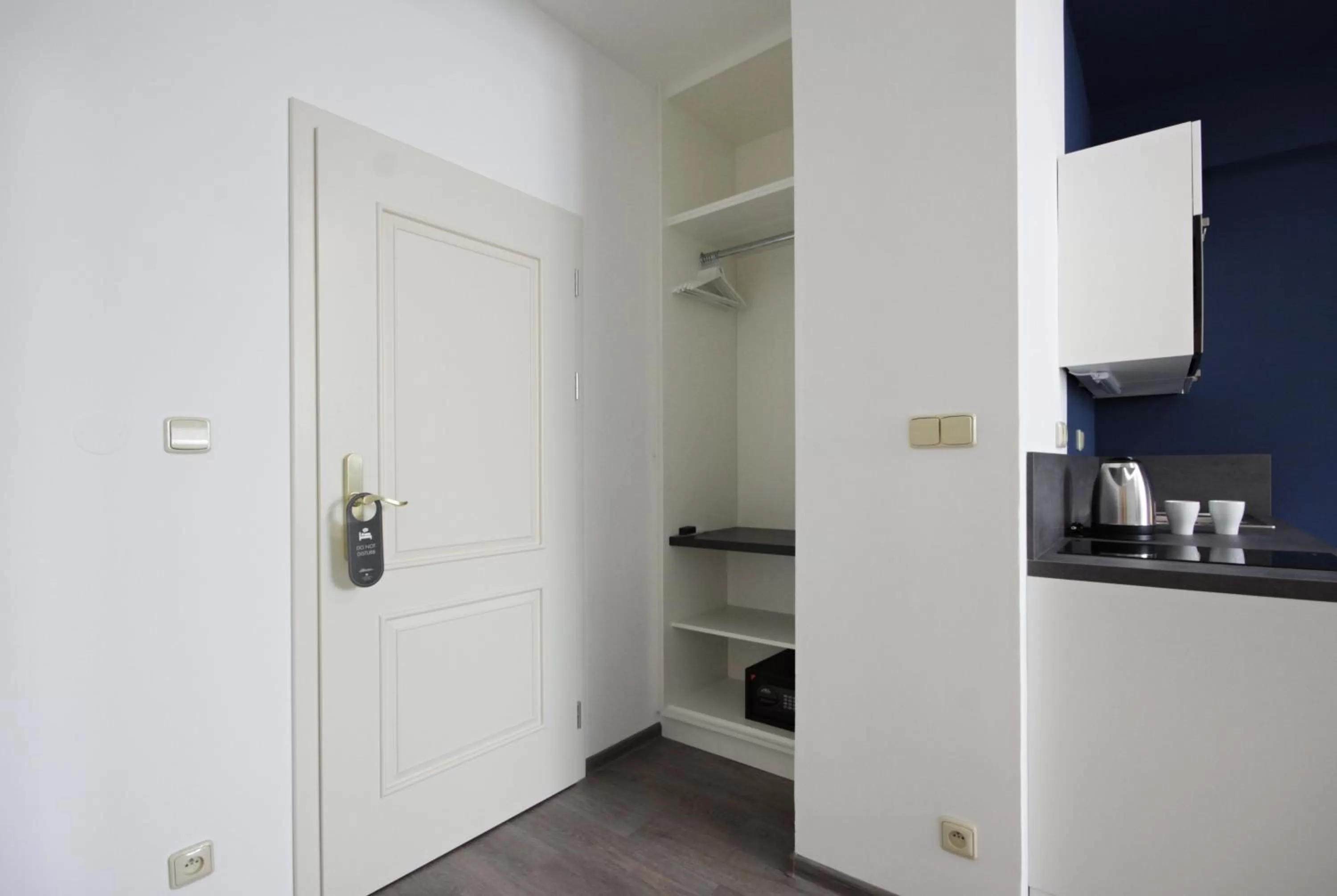 Kitchen or kitchenette in Alveo Suites