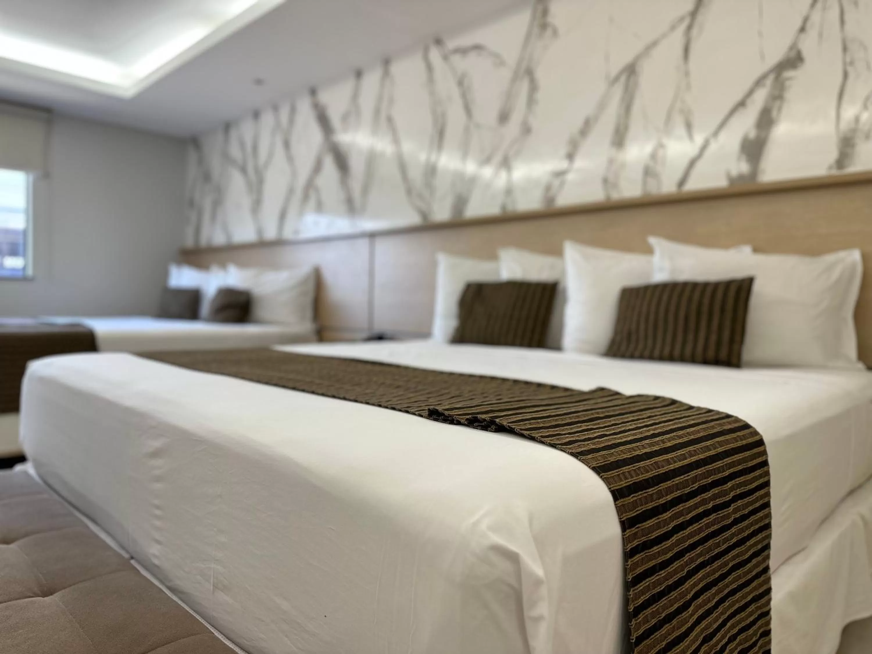 Bed in Atrium Confort Hotels