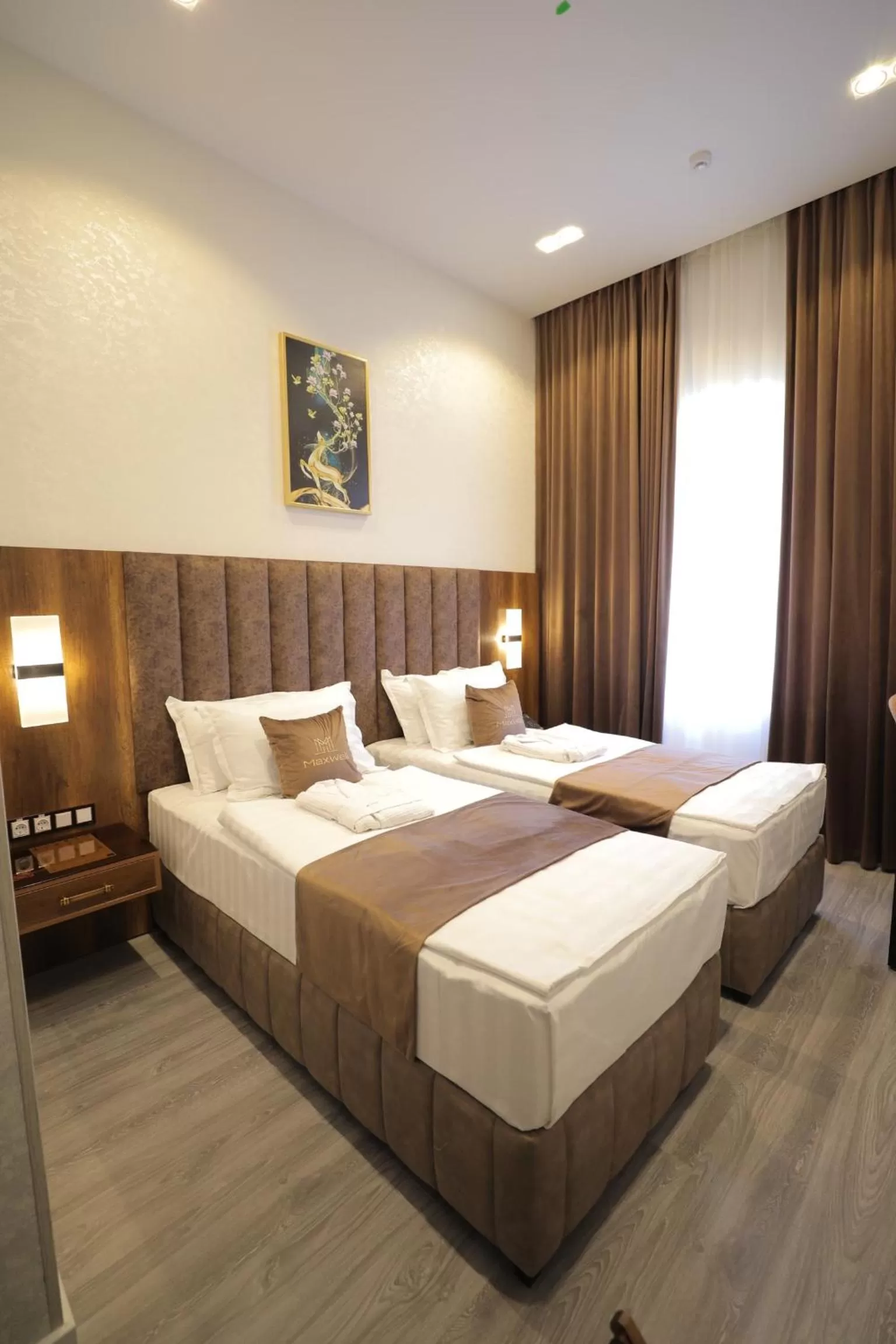 Bed in MaxWell Hotel & SPA