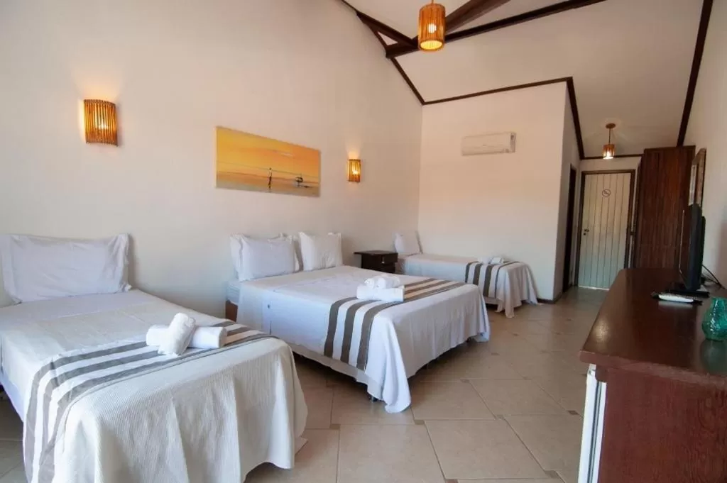 Bed in Riviera Búzios Hotel