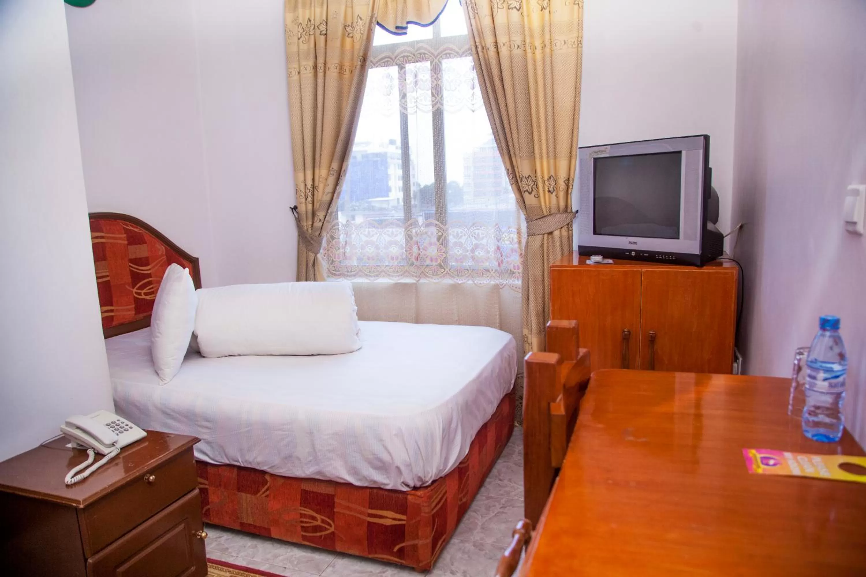 Bed in Natron Palace Hotel