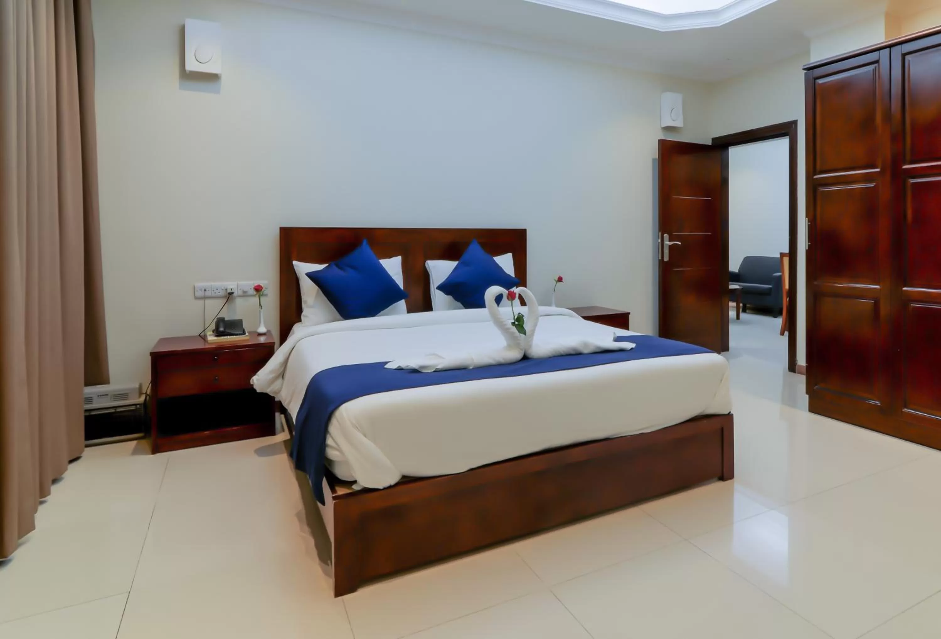 Bedroom, Bed in Tanzanite Executive Suites