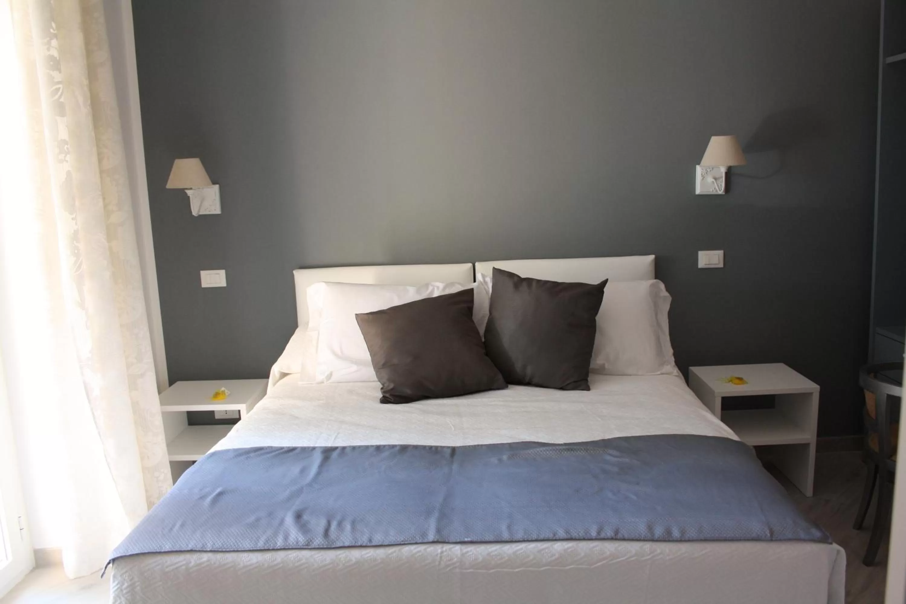 Bed in GLEM rooms & breakfast