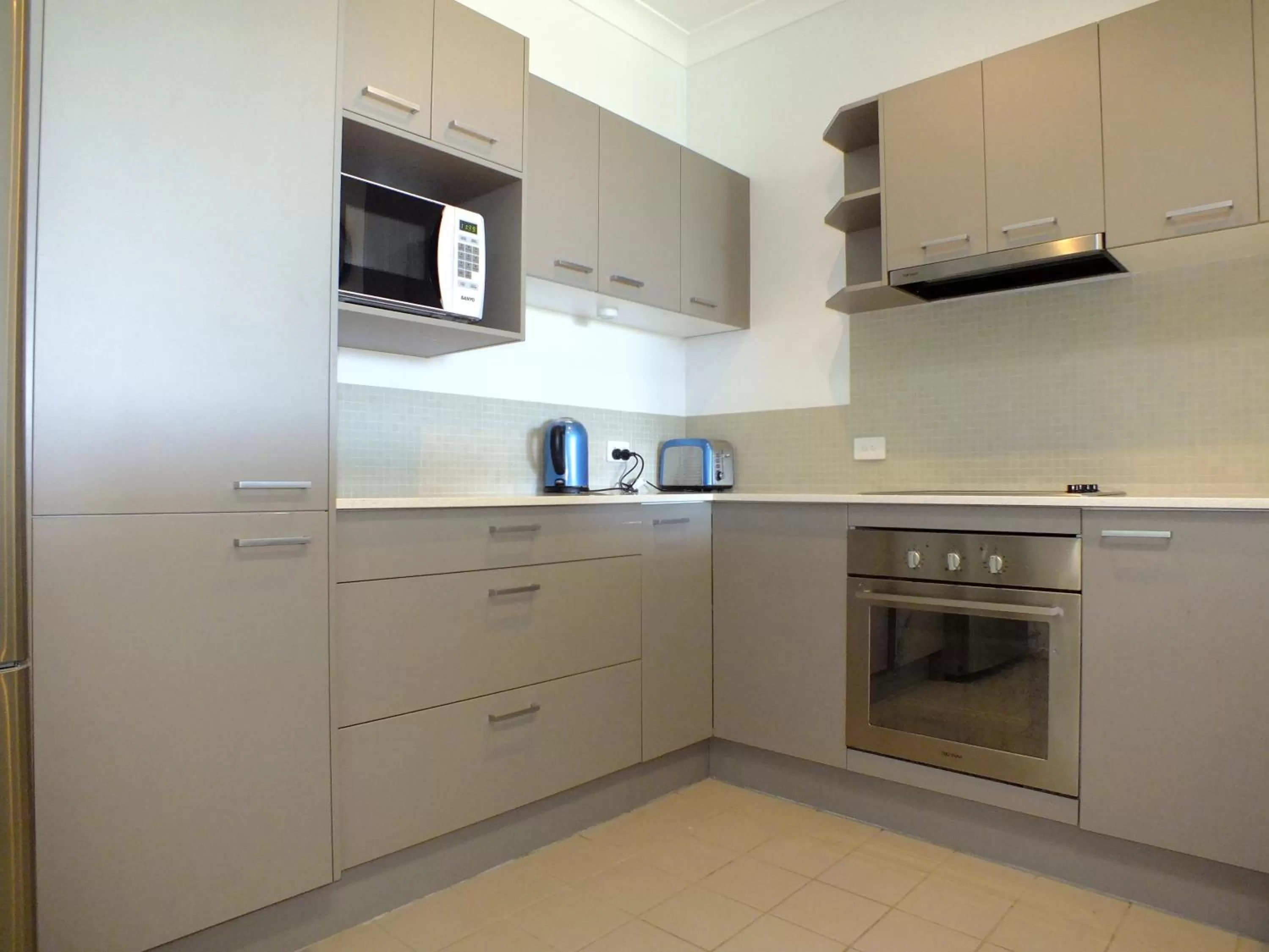 Kitchen or kitchenette in Pacific Marina Apartments