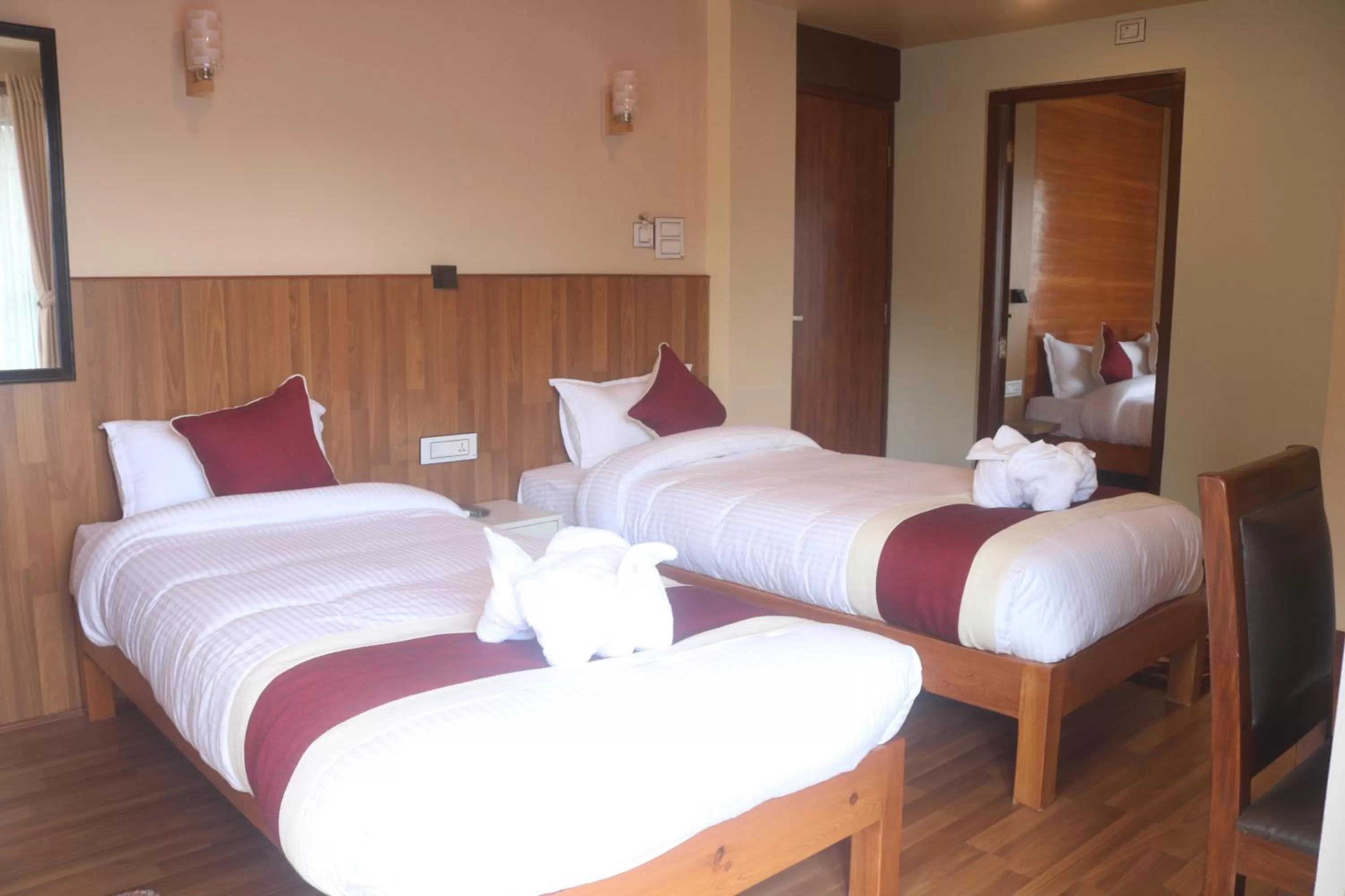 Bedroom, Bed in Hotel Family Ties Pvt. Ltd.