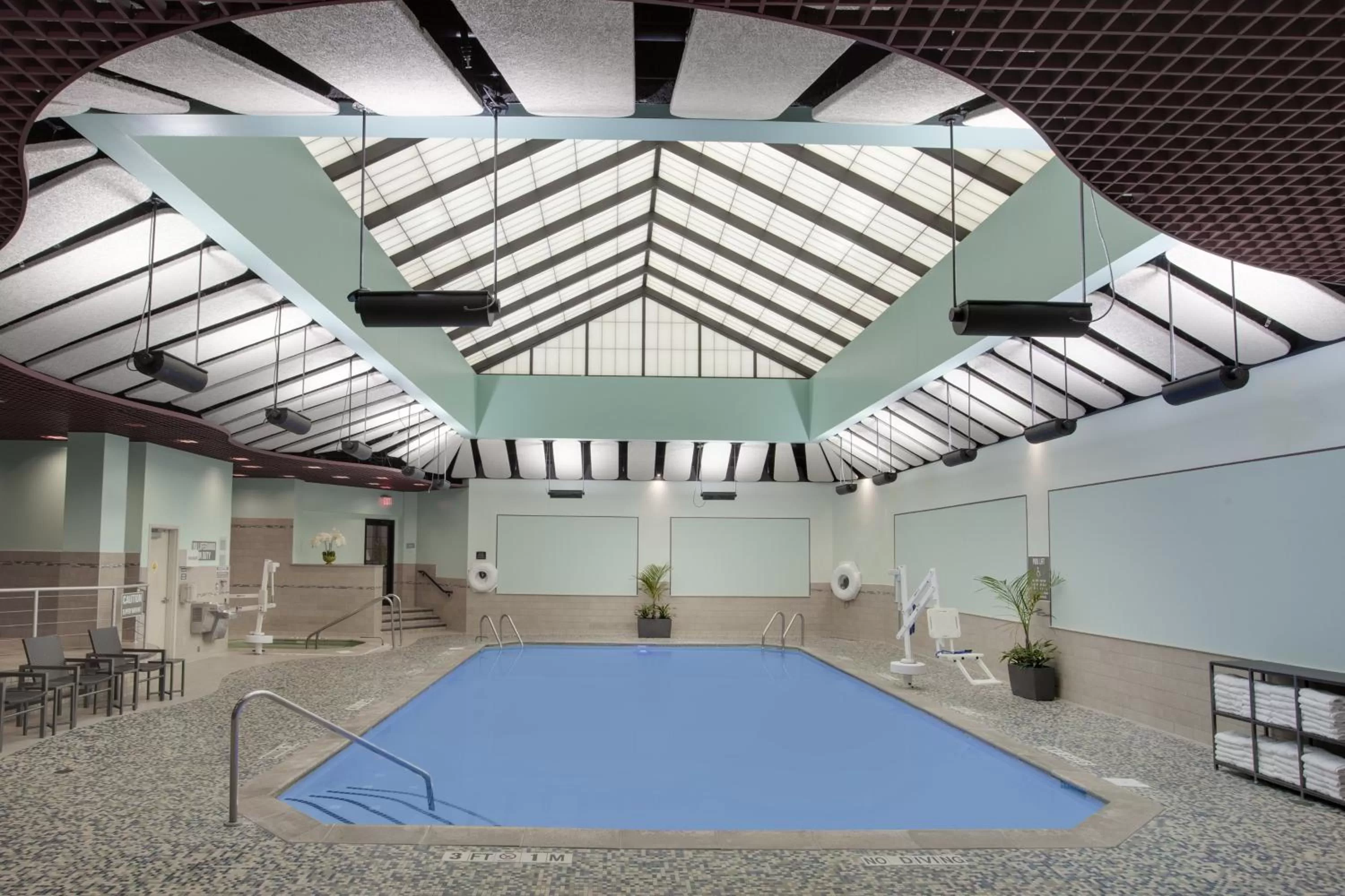 Swimming pool in Crowne Plaza Lansing by IHG