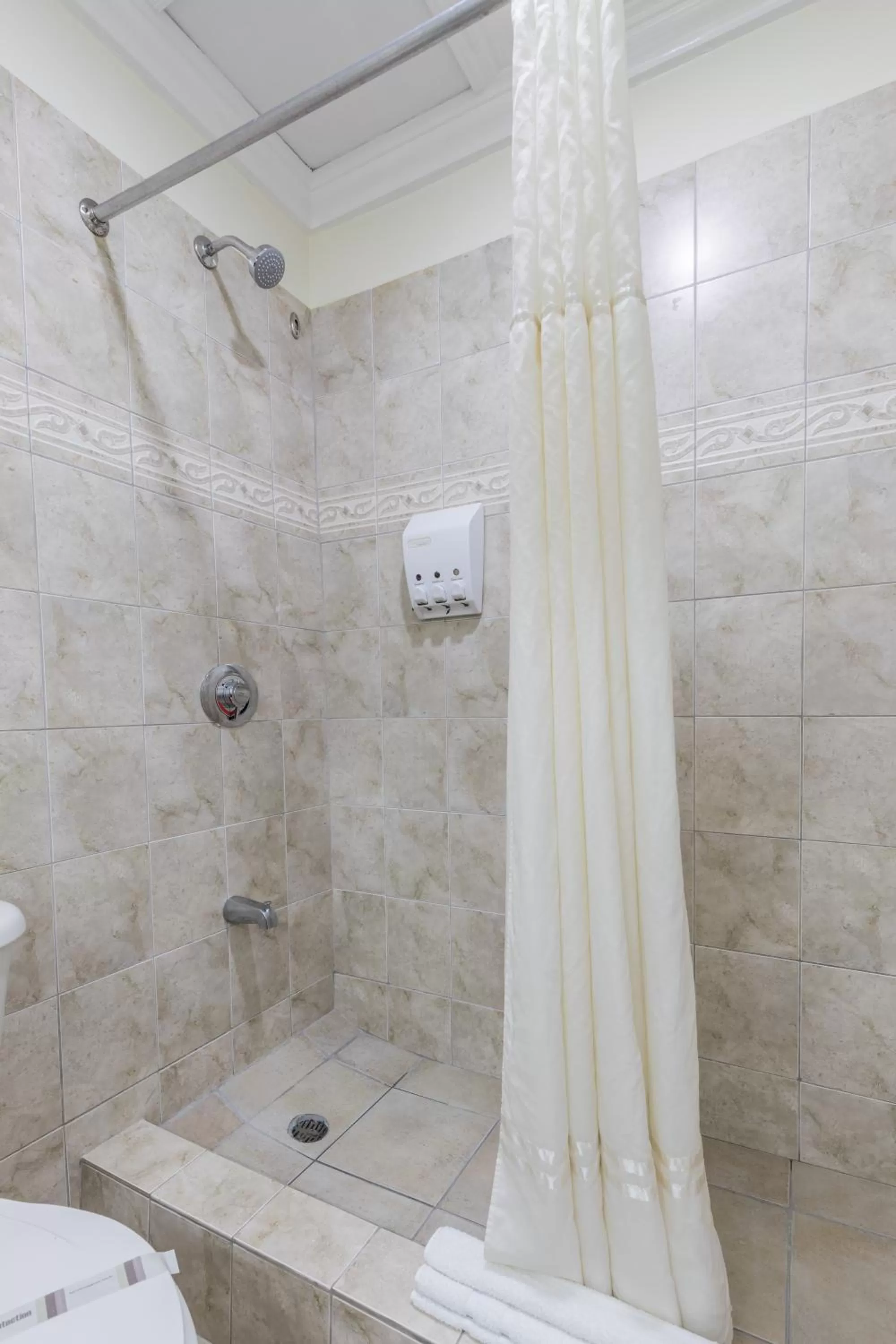 Bathroom in Bay Gardens Hotel