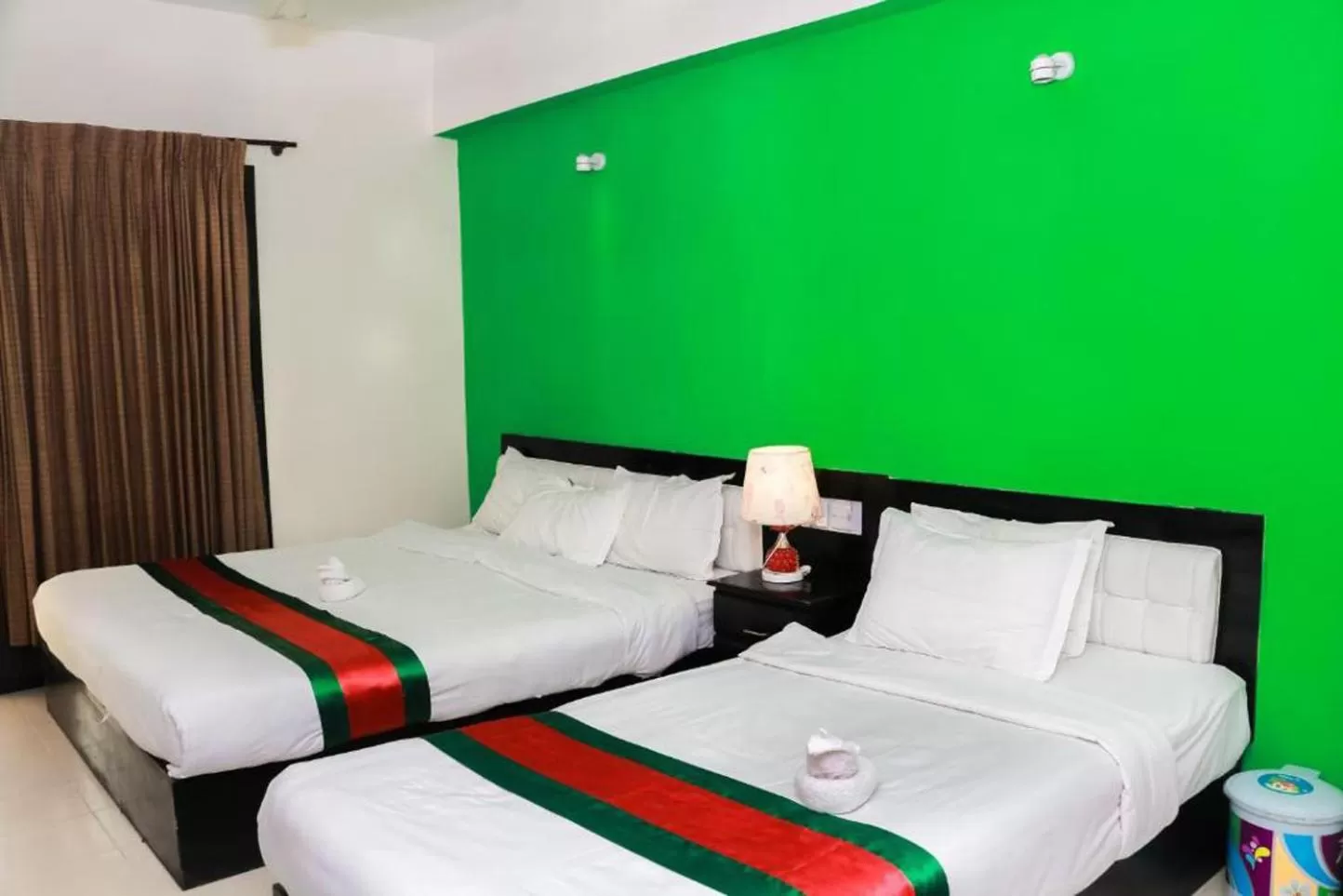 Photo of the whole room, Bed in Central Inn Dhaka City Centre