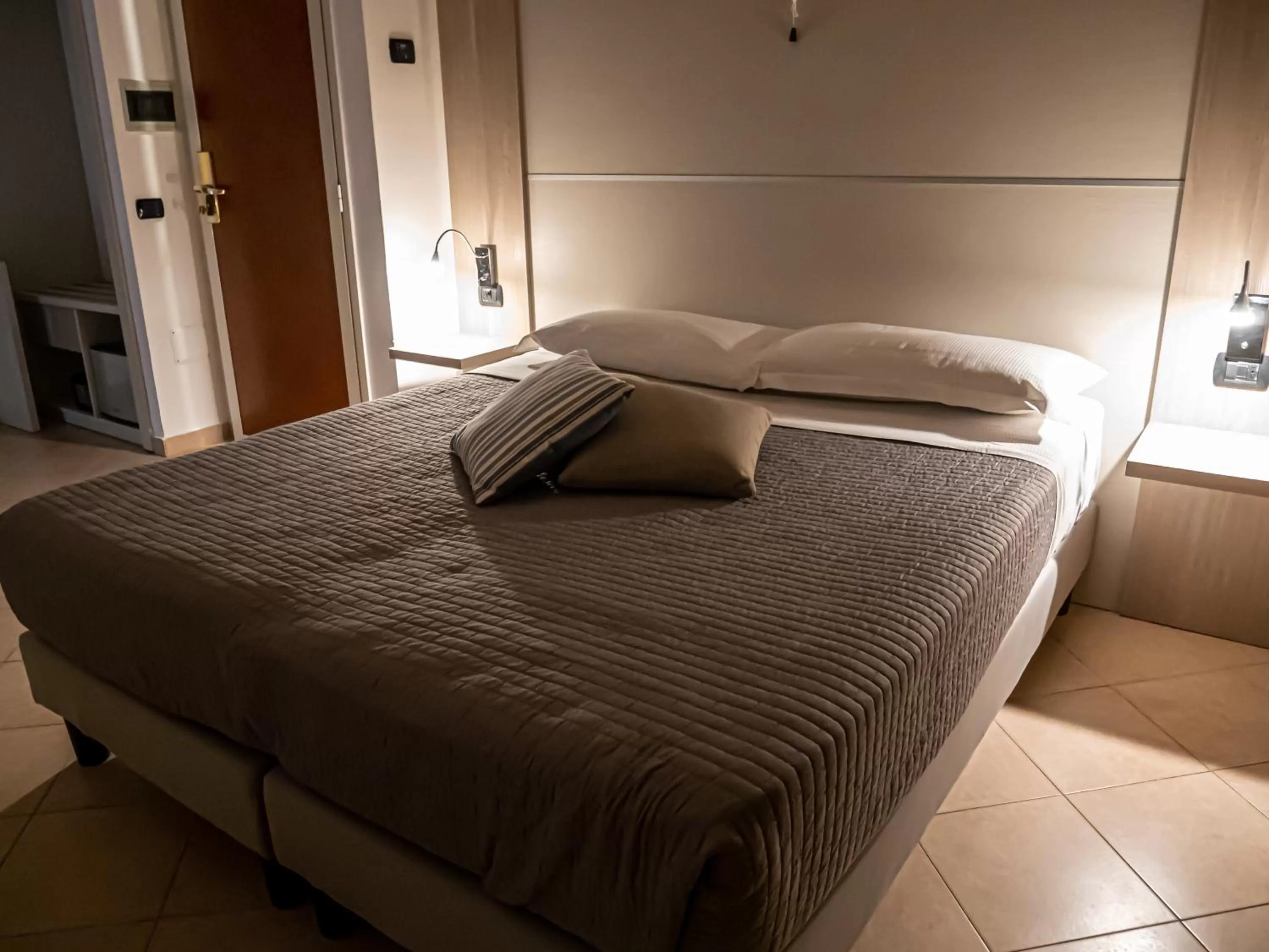 Bed in San Marco Hotel