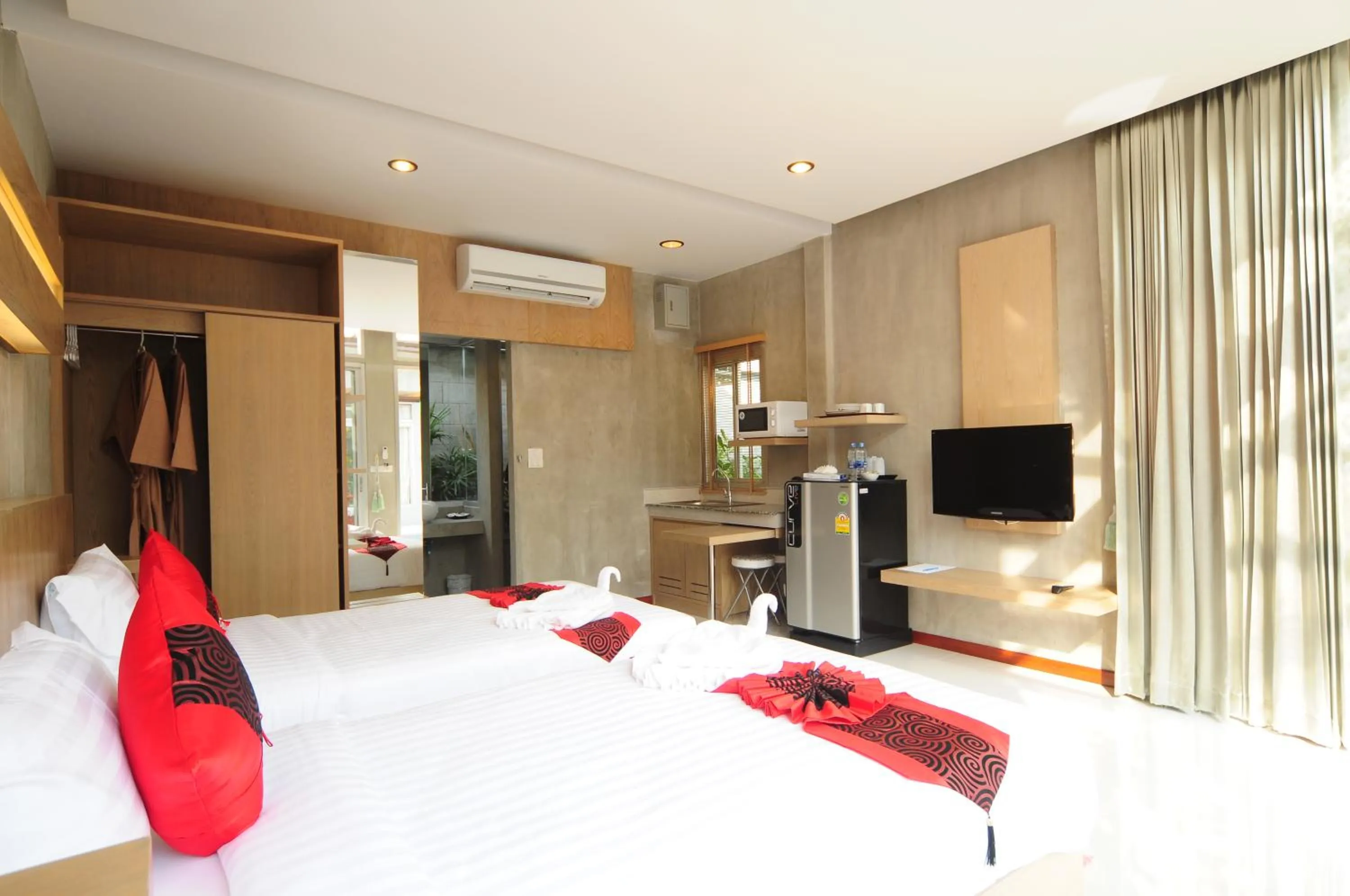Bed in Phu NaNa Boutique Hotel - SHA Plus