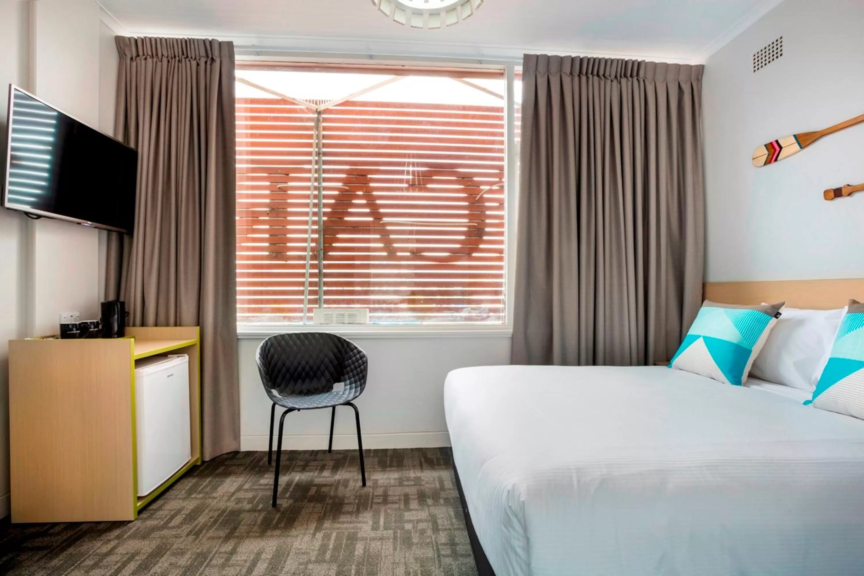 Seating area, Bed in Nightcap at Caringbah Hotel