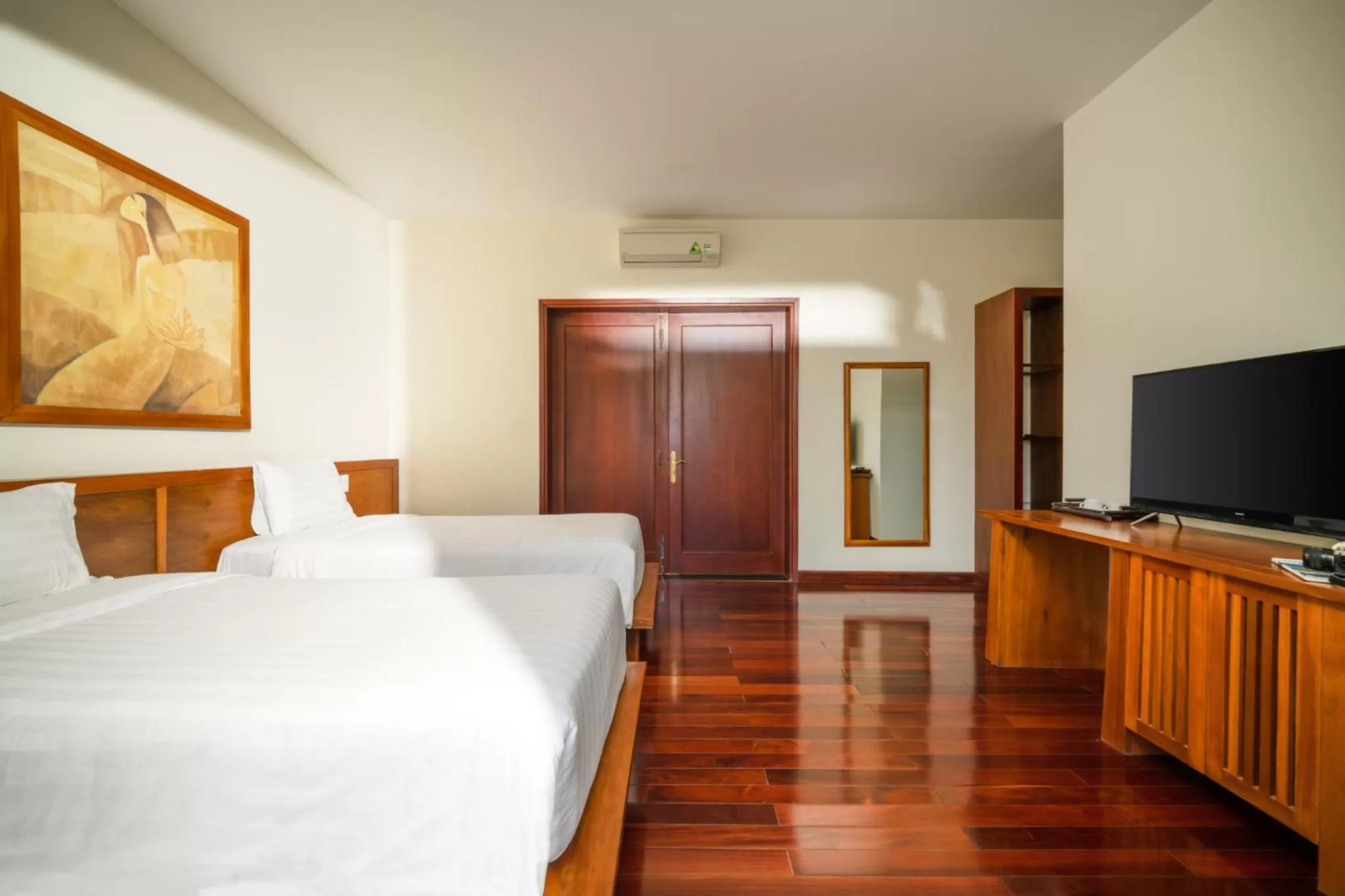 Bed, TV/Entertainment Center in Palm Village Hoian - STAY 24H