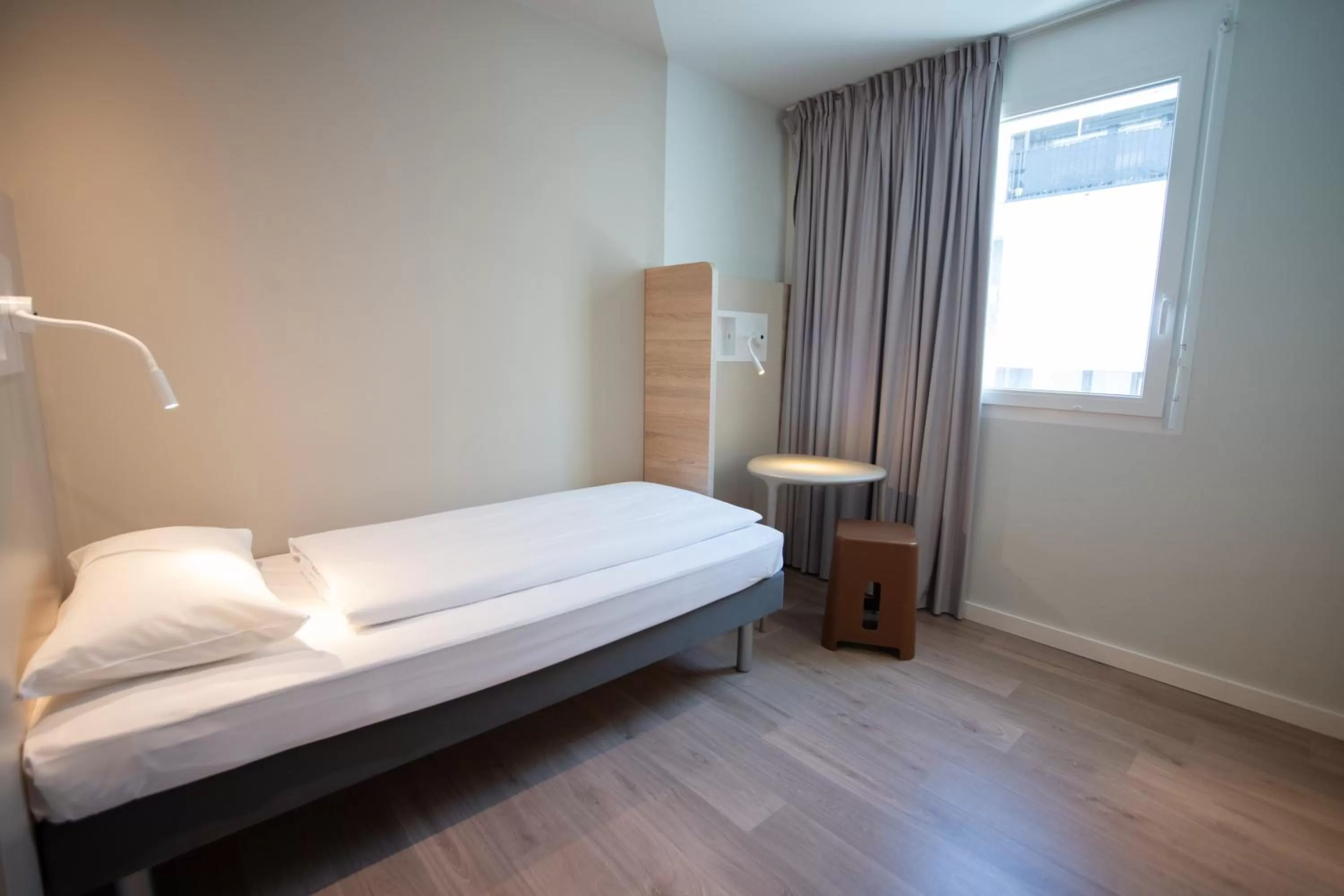 Photo of the whole room, Bed in ibis budget Fribourg