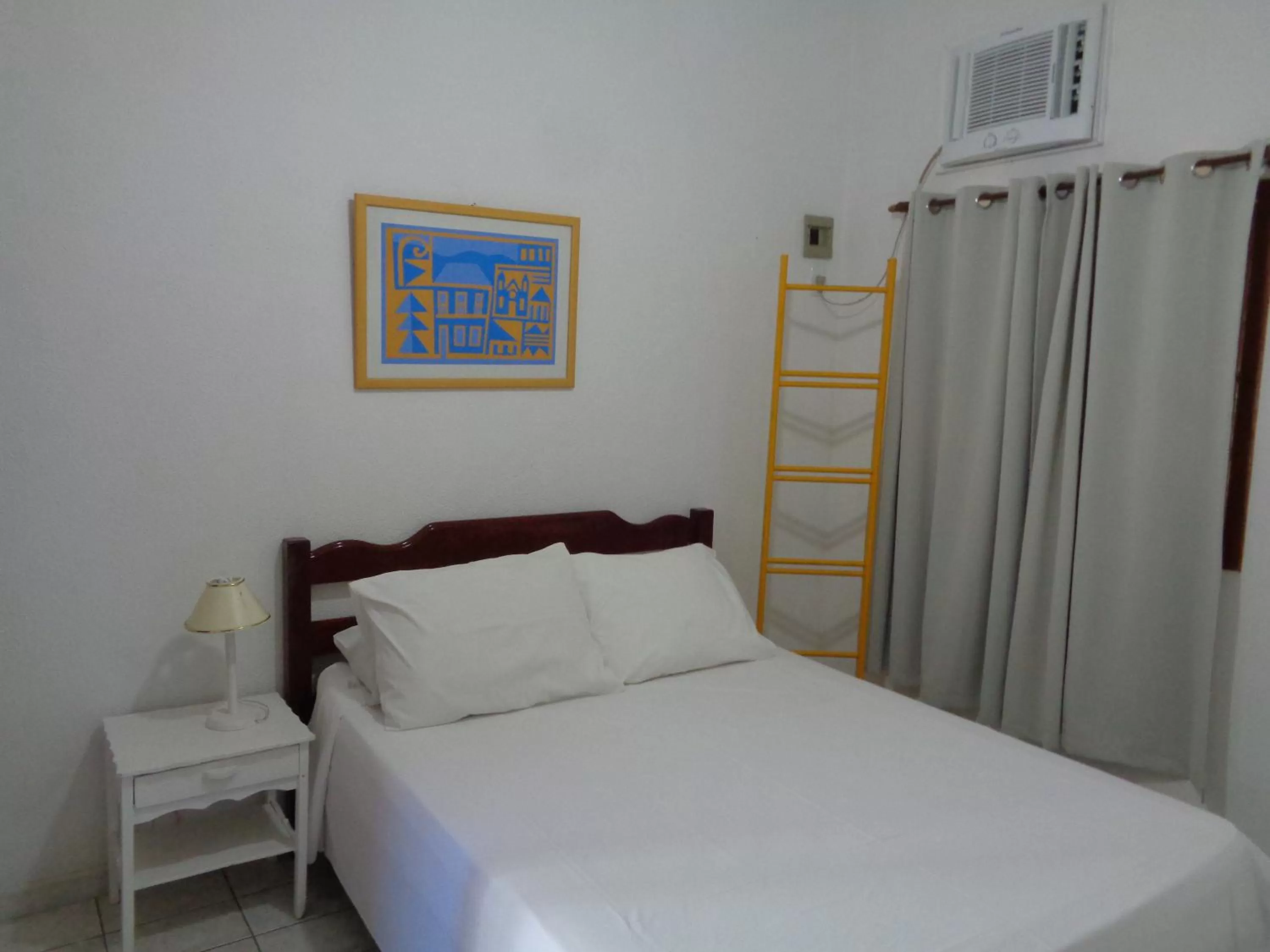 Bed in Pousada Barcarola