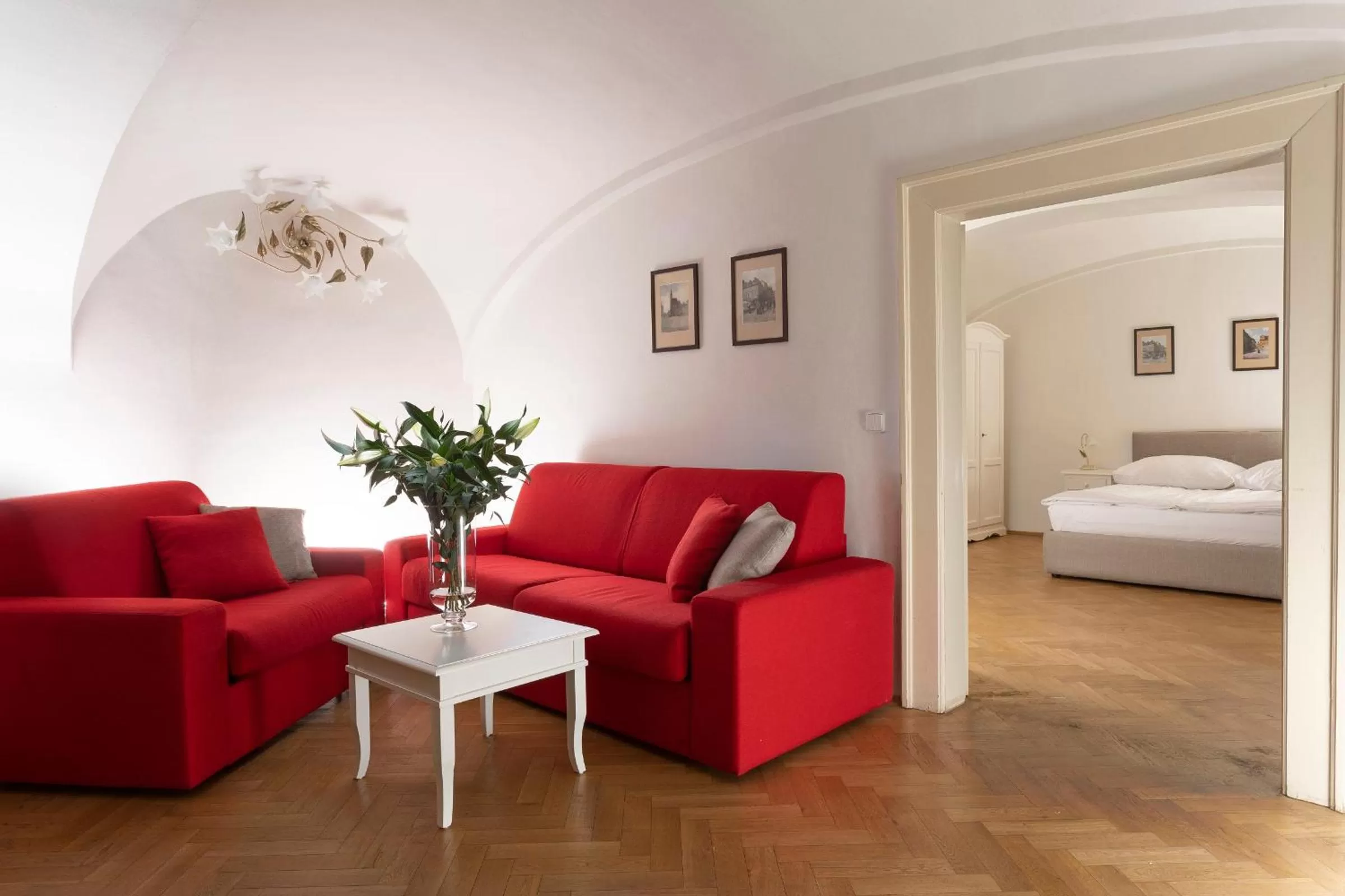 Bed in Three Golden Crowns Apartments