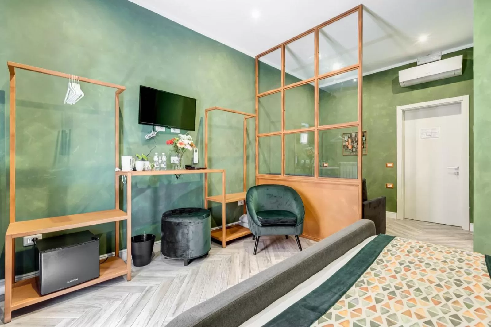 Bed in Ripetta Deluxe Suites