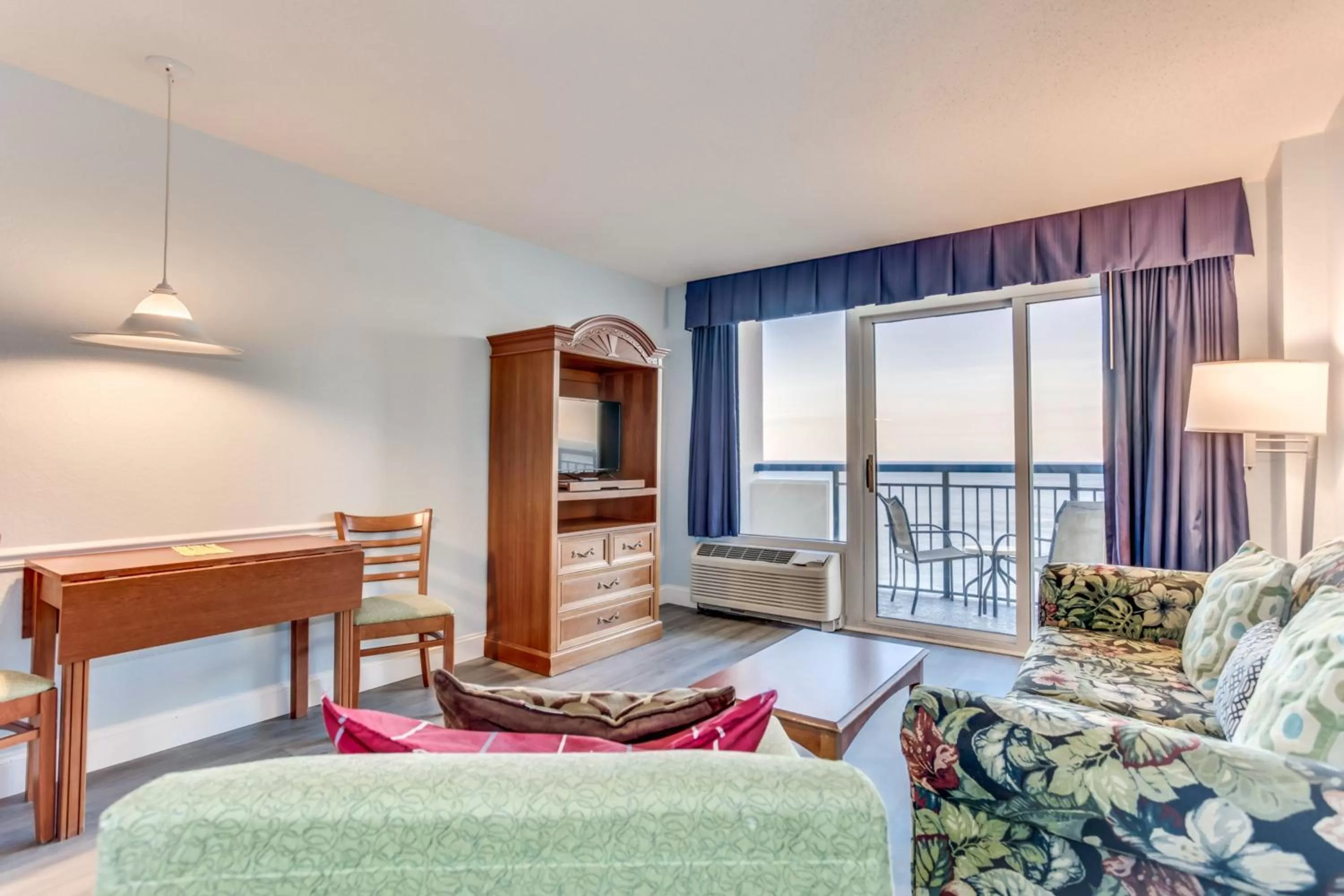 Living room, Seating Area in Boardwalk Beach Resort Condo w Oceanfront Balcony