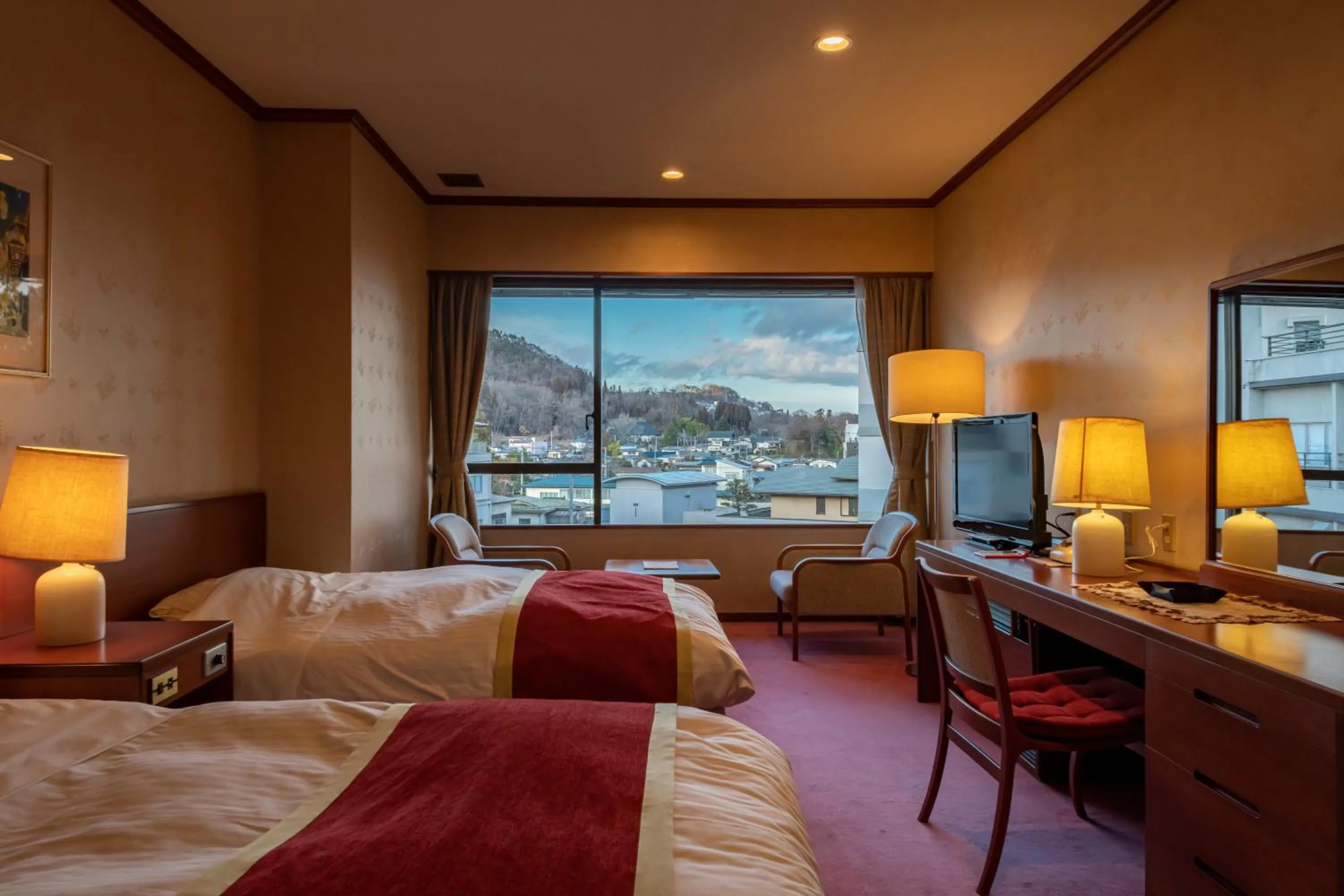 Photo of the whole room, Bed in Senkeien Tsukioka Hotel
